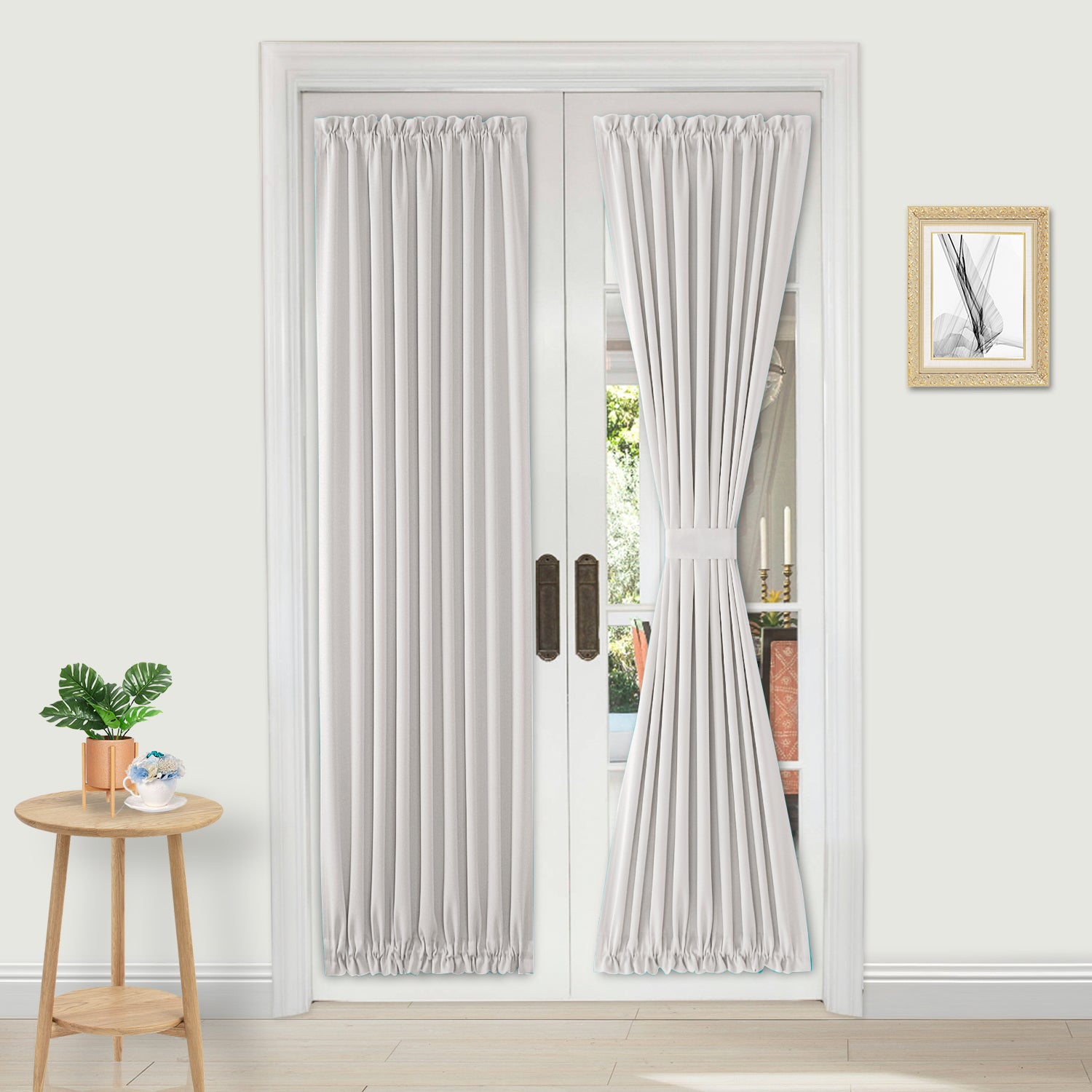 DWCN French blackout door curtain panel with tieback, black fabric, and elegant design for blocking light and adding privacy.