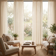 Light-colored Calliope Cream Linen Voile Curtain by DWCN Official hanging smoothly, showcasing its airy and soft fabric texture.