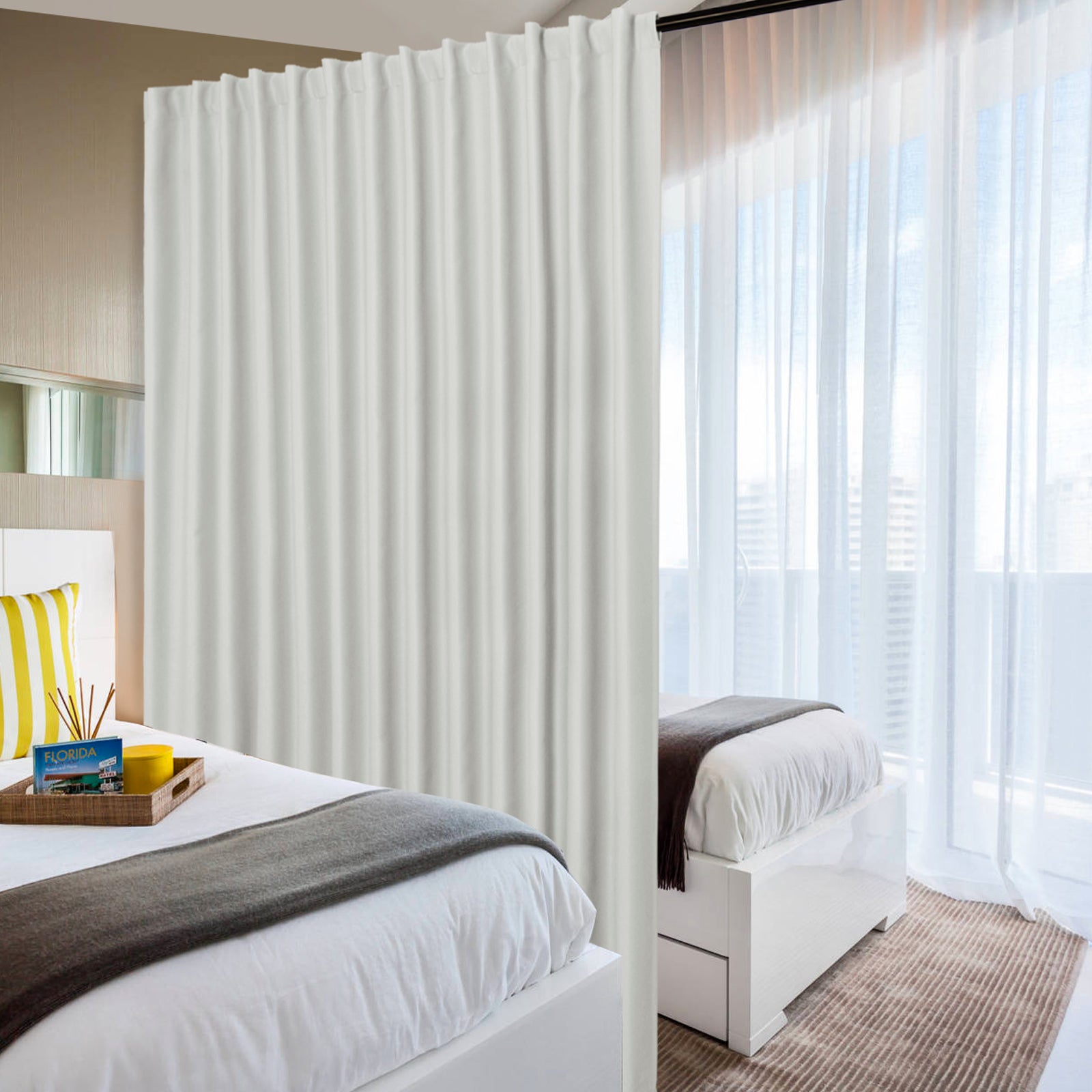 DWCN Official black blackout curtain panel, wide width room divider curtain in black fabric hanging smoothly.