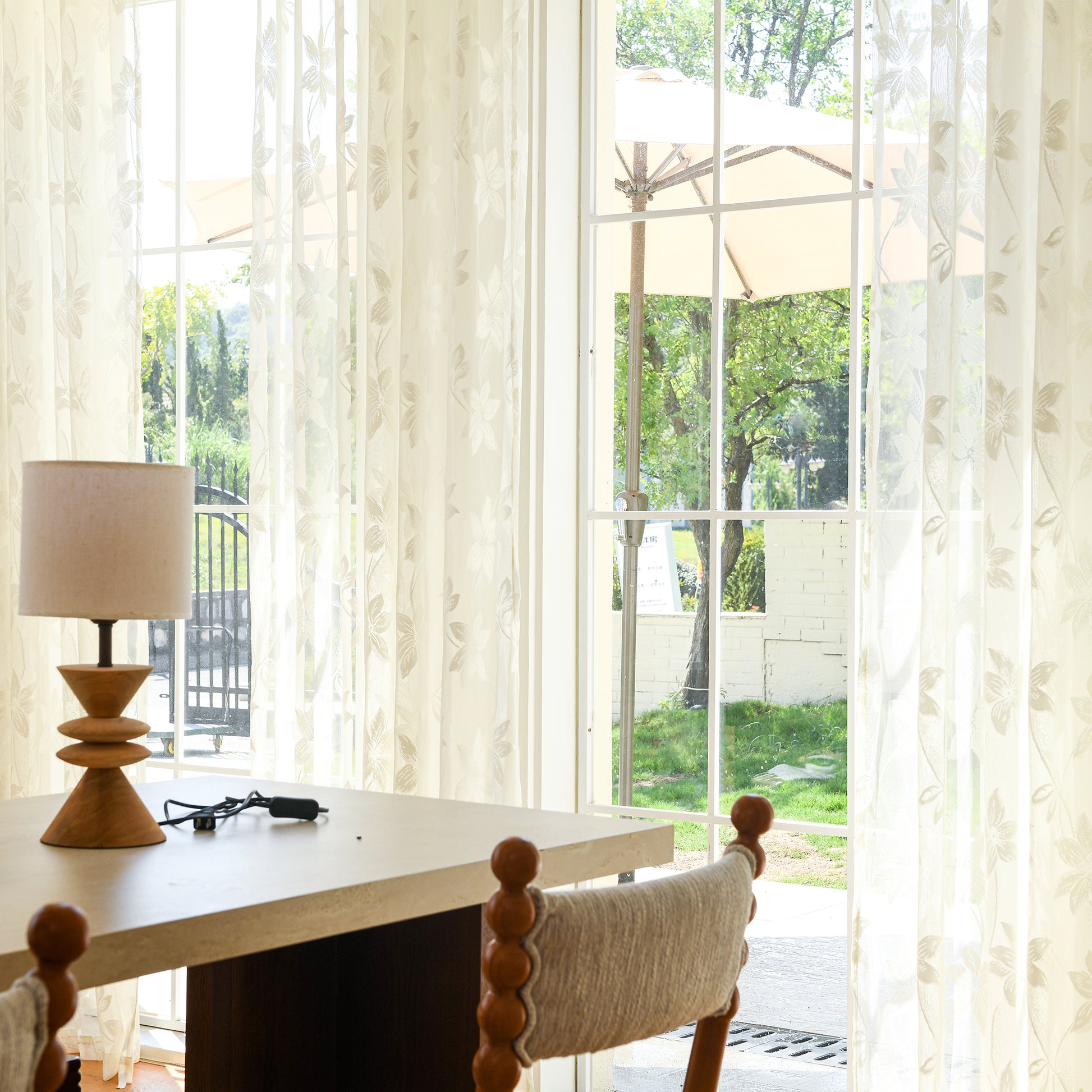 Custom lace voile curtains styled in airy interior