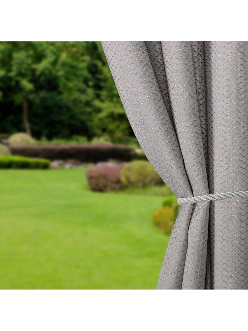 Outdoor curtains from DWCN Official hanging outdoors, featuring lightweight fabric and neutral color for patio or garden decor.