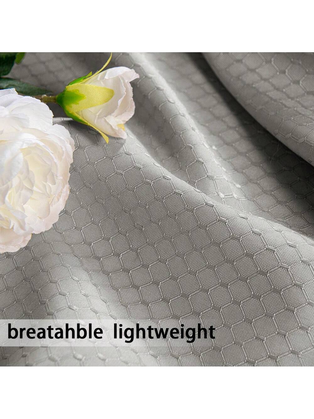 DWCN Outdoor Curtains hanging outdoors, lightweight fabric, providing privacy and shade for patio or garden spaces.