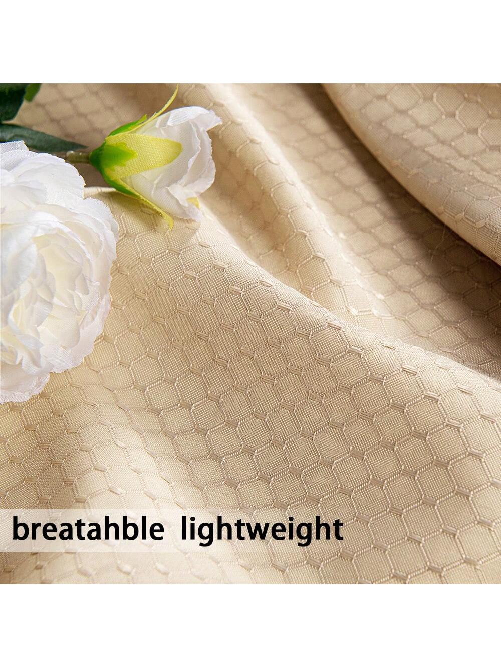 Outdoor curtains from DWCN Official, beige fabric with grommet top, ideal for patio or garden privacy and sun protection