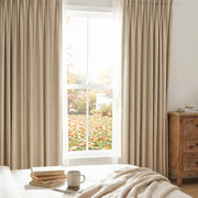 Natural linen blackout woven texture curtains in black, showcasing a modern, textured fabric with a sleek, elegant appearance.