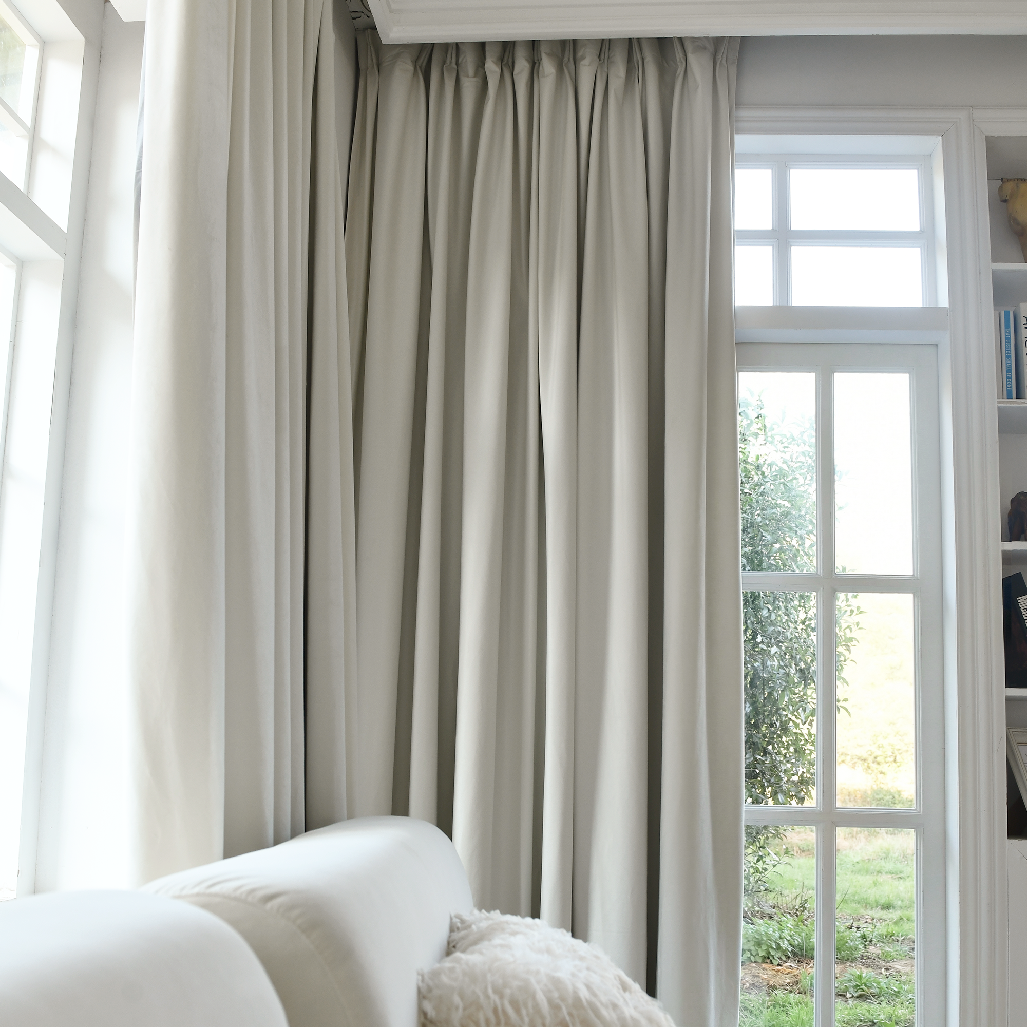 Black velvet blackout curtains by DWCN Official, stylish custom premium drapes blocking sunlight and providing privacy.