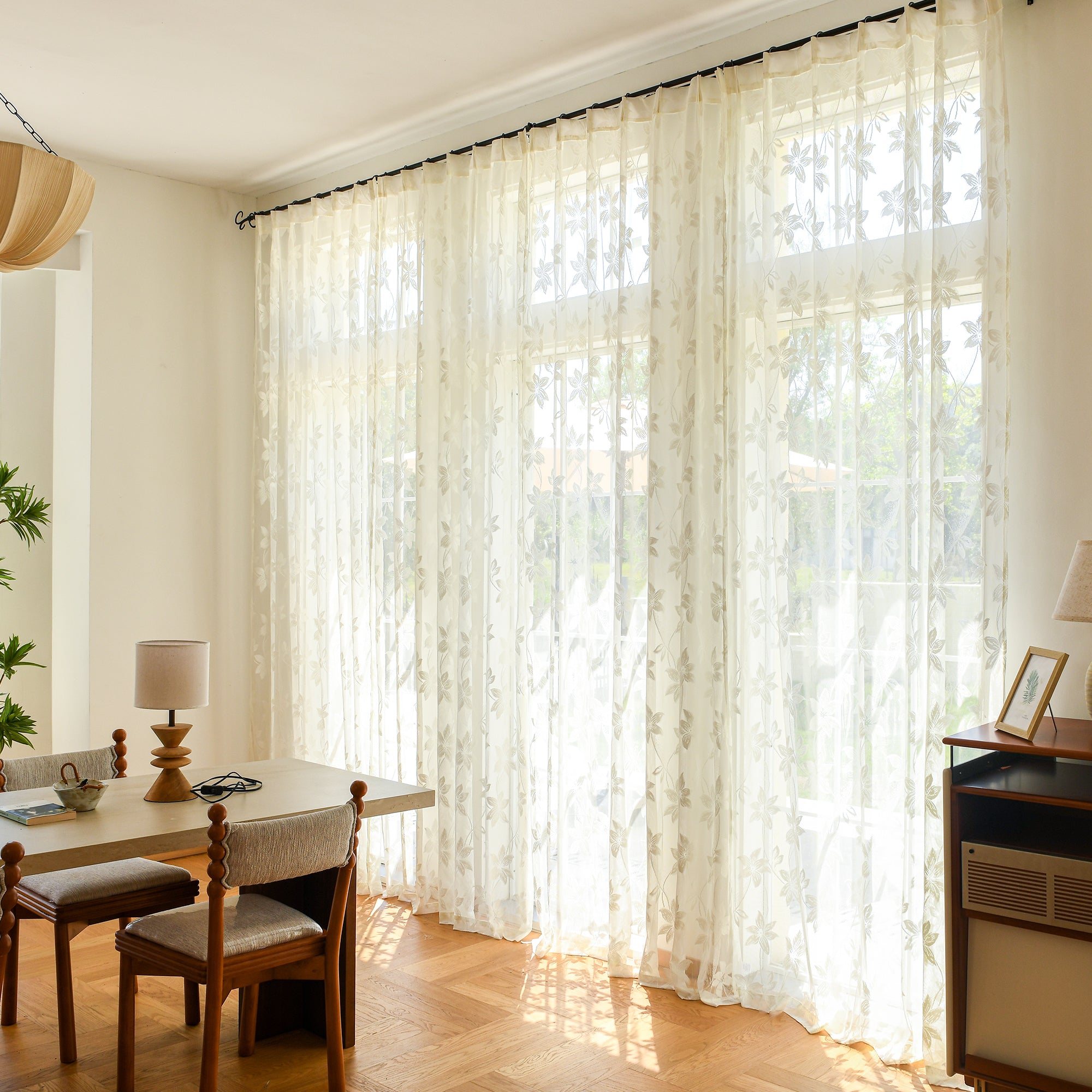 Lace voile semi-sheer curtains filtering natural daylight