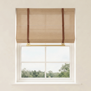 DWCN Official Imogen Custom Linen Roman Shades featuring elegant, light-colored fabric and classic fold design for stylish window coverage.