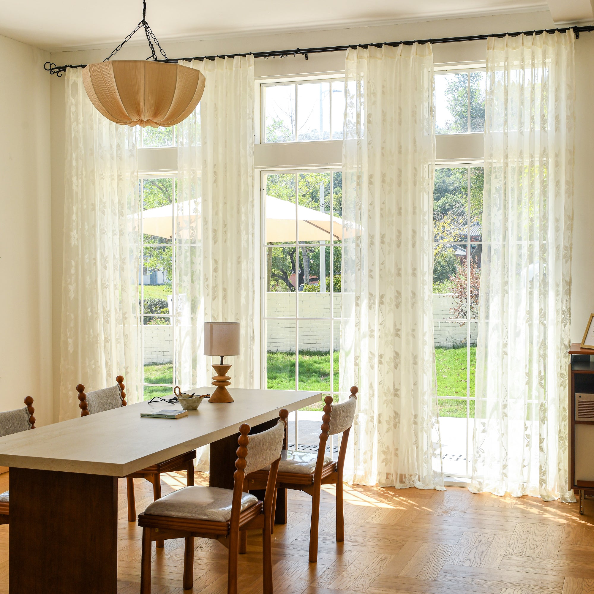 Custom semi-sheer lace voile curtains in bright living room