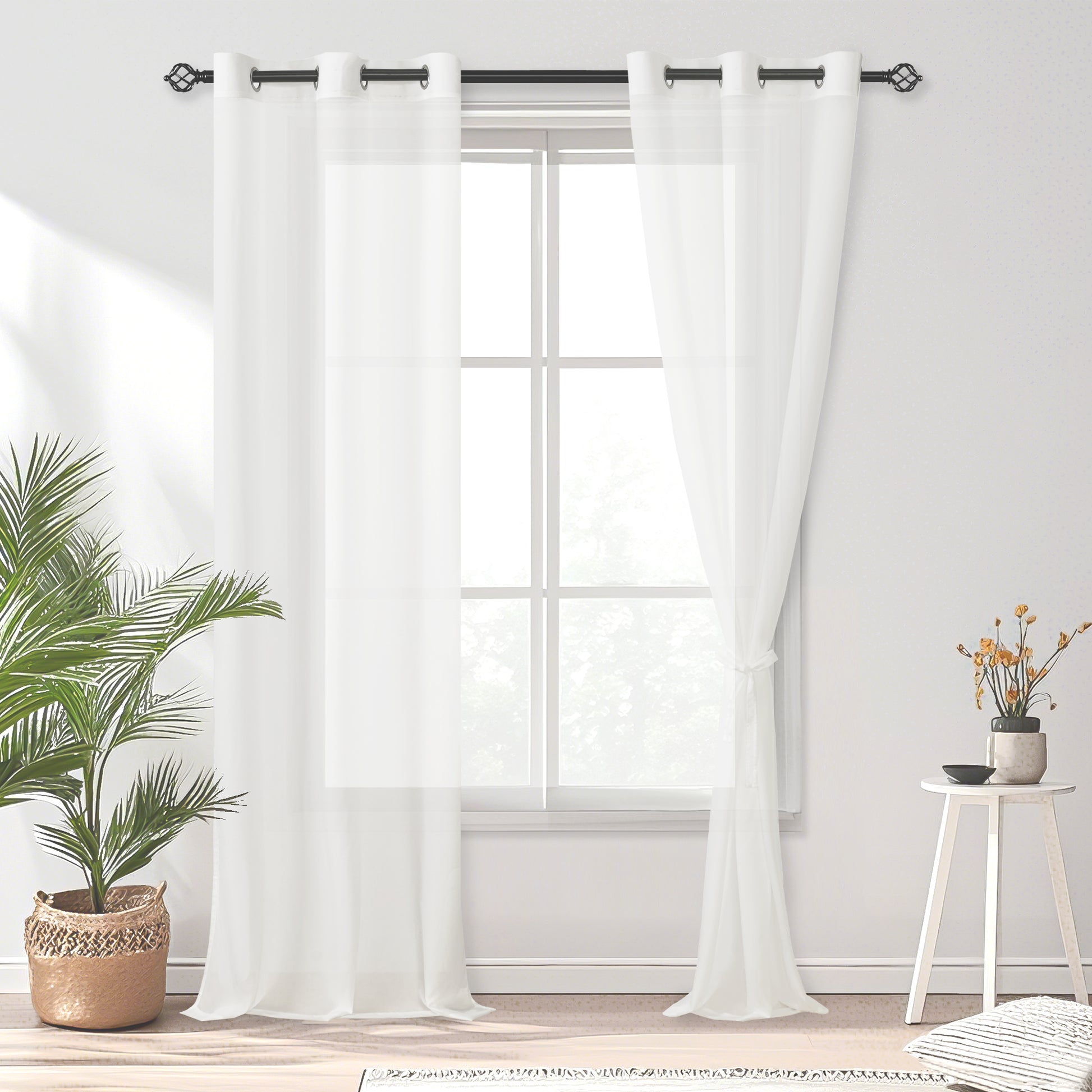 Light-filtering DWCN Official privacy pet chiffon sheer curtains hanging in a window, providing a soft, elegant look.