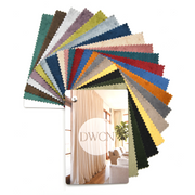 DWCN Official premium velvet blackout fabric swatch booklet featuring black fabric samples on textured pages.