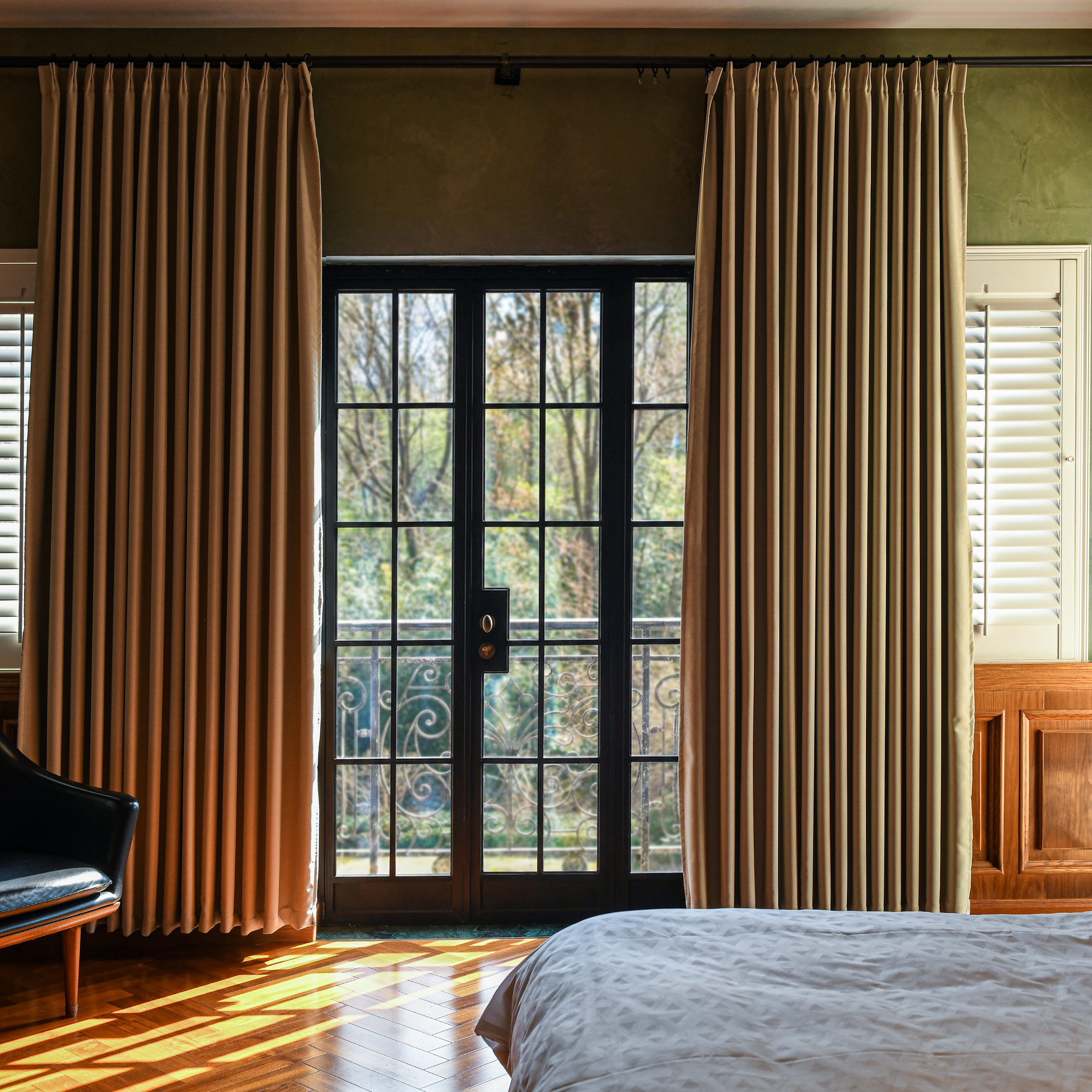 Black heavyweight cotton blackout curtains from DWCN Official, showcasing their thick fabric and sleek black design for room darkening.