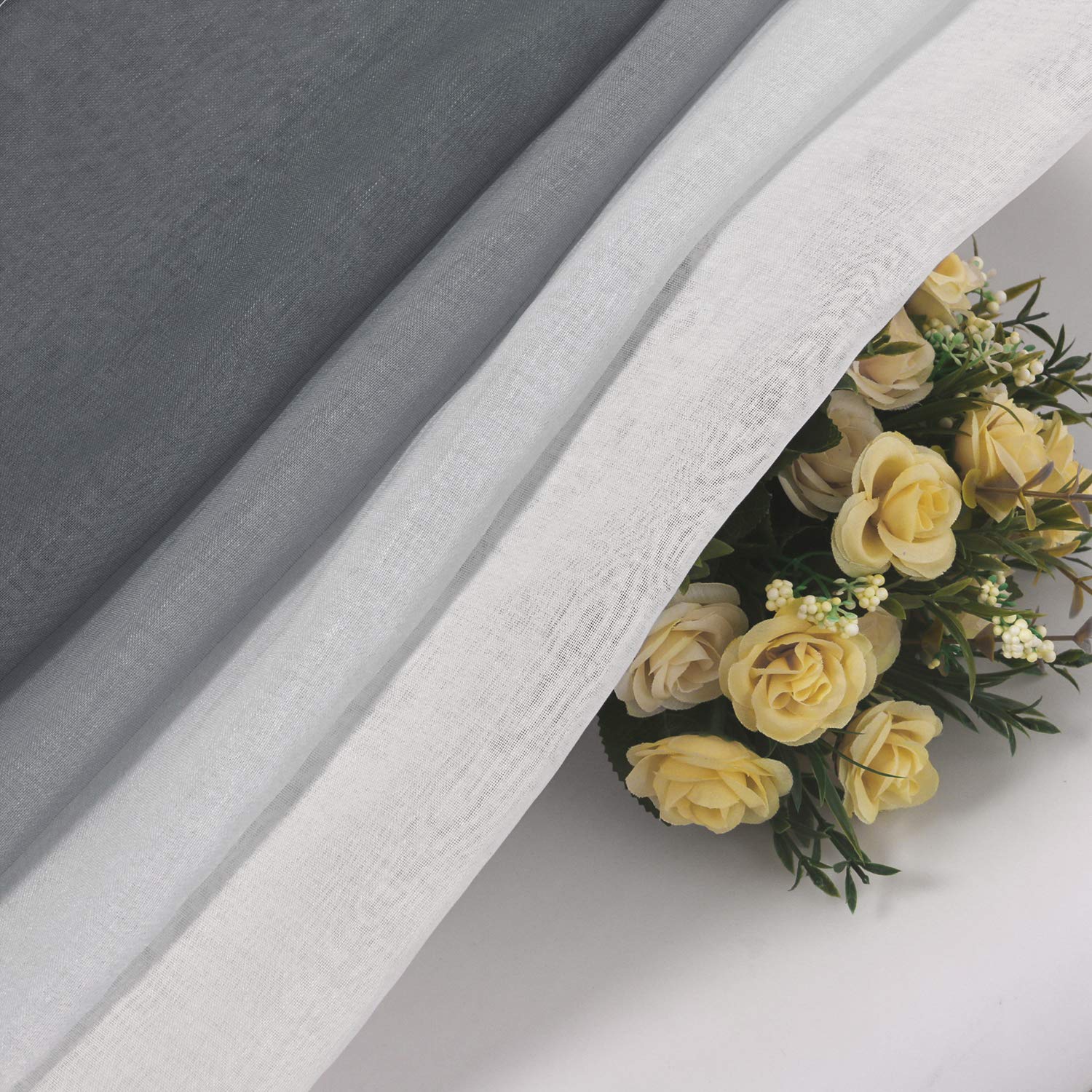 Custom linen texture ombre sheer curtains from DWCN Official hanging in a window, showcasing soft fabric and gradient color design.