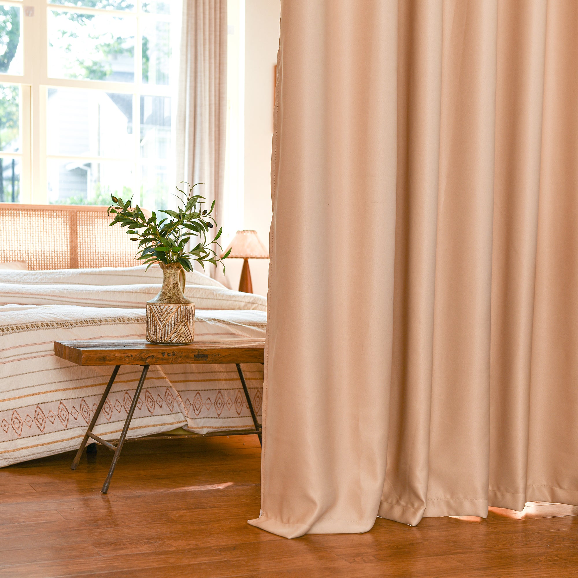 Room divider blackout curtains providing privacy in open-plan interior