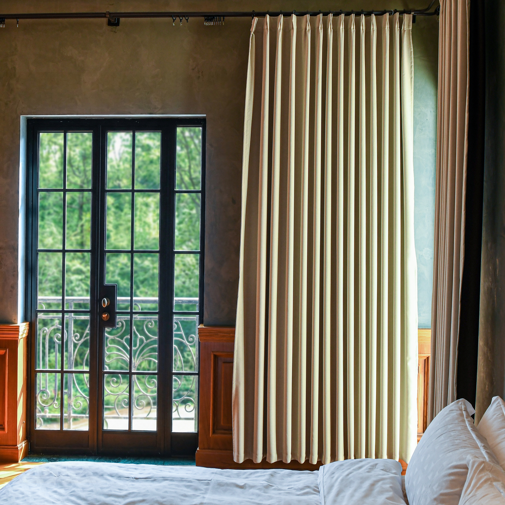 Black heavyweight cotton blackout curtains by DWCN Official, showcasing their thick fabric and dark black color for room darkening