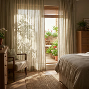 Demeter Aurata patterned linen curtains by DWCN Official hanging in a room, showcasing a stylish, natural fabric design.