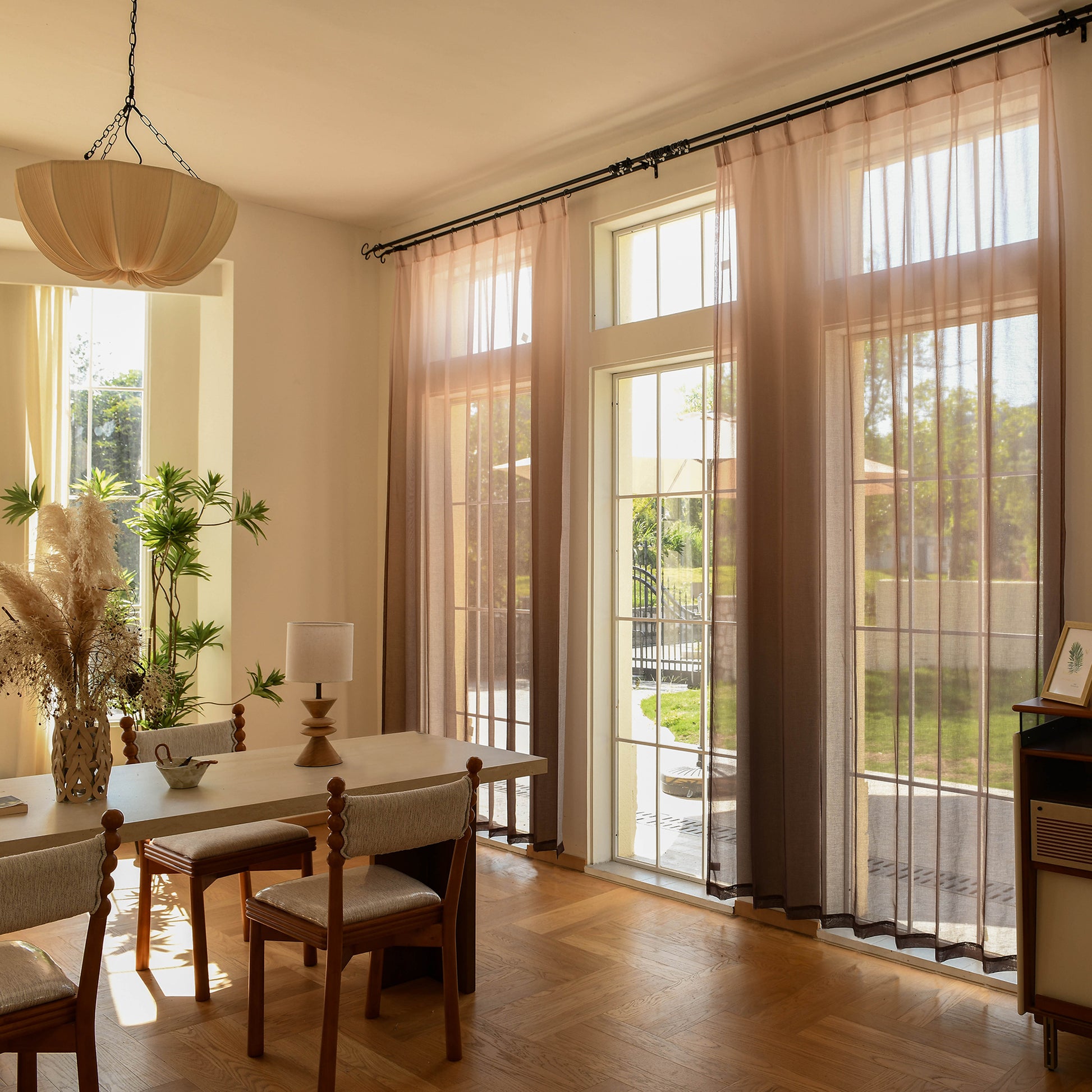 Custom vertical ombre sheer curtains in modern living room with soft natural light