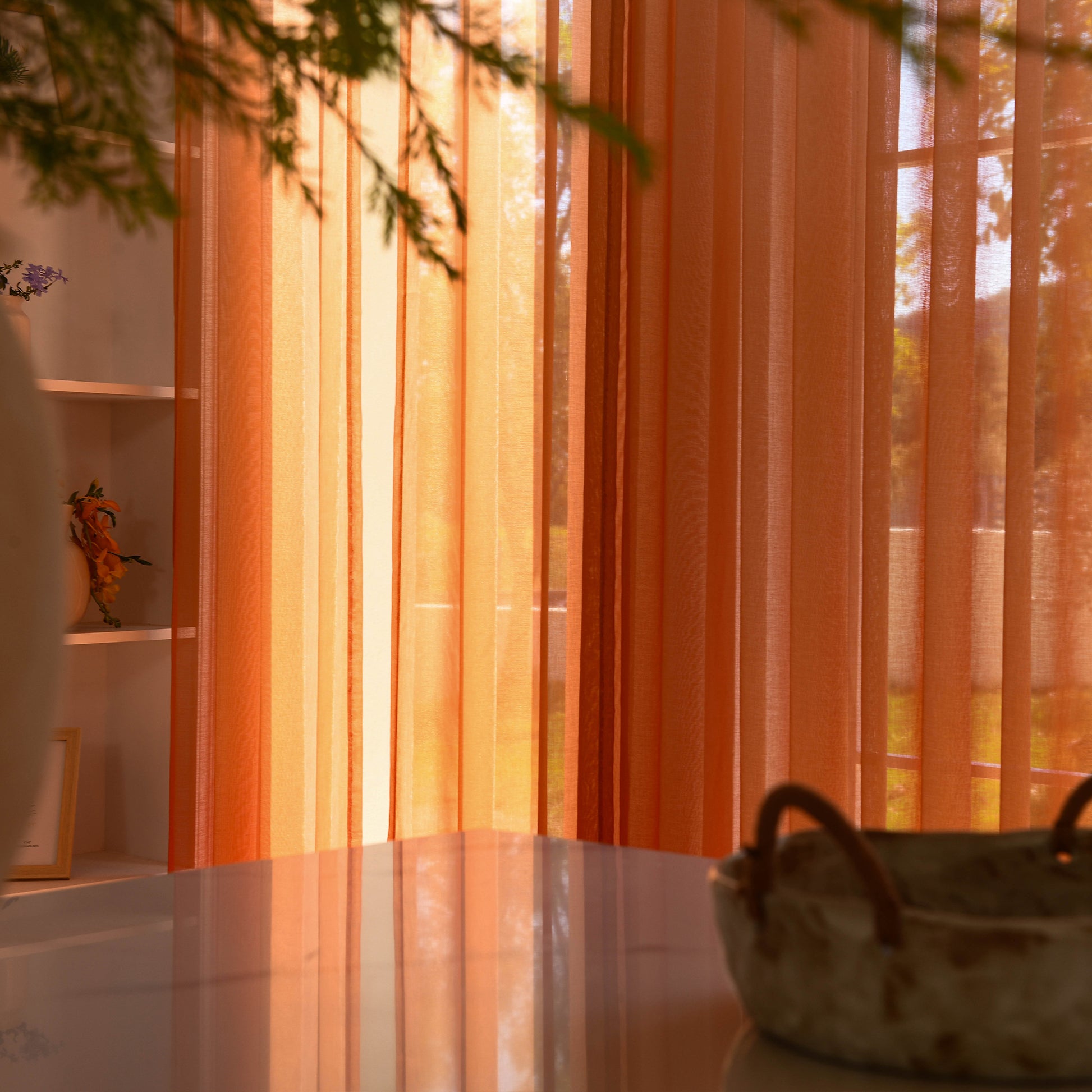 Custom ombre sheer curtains filtering daylight in minimalist home setting