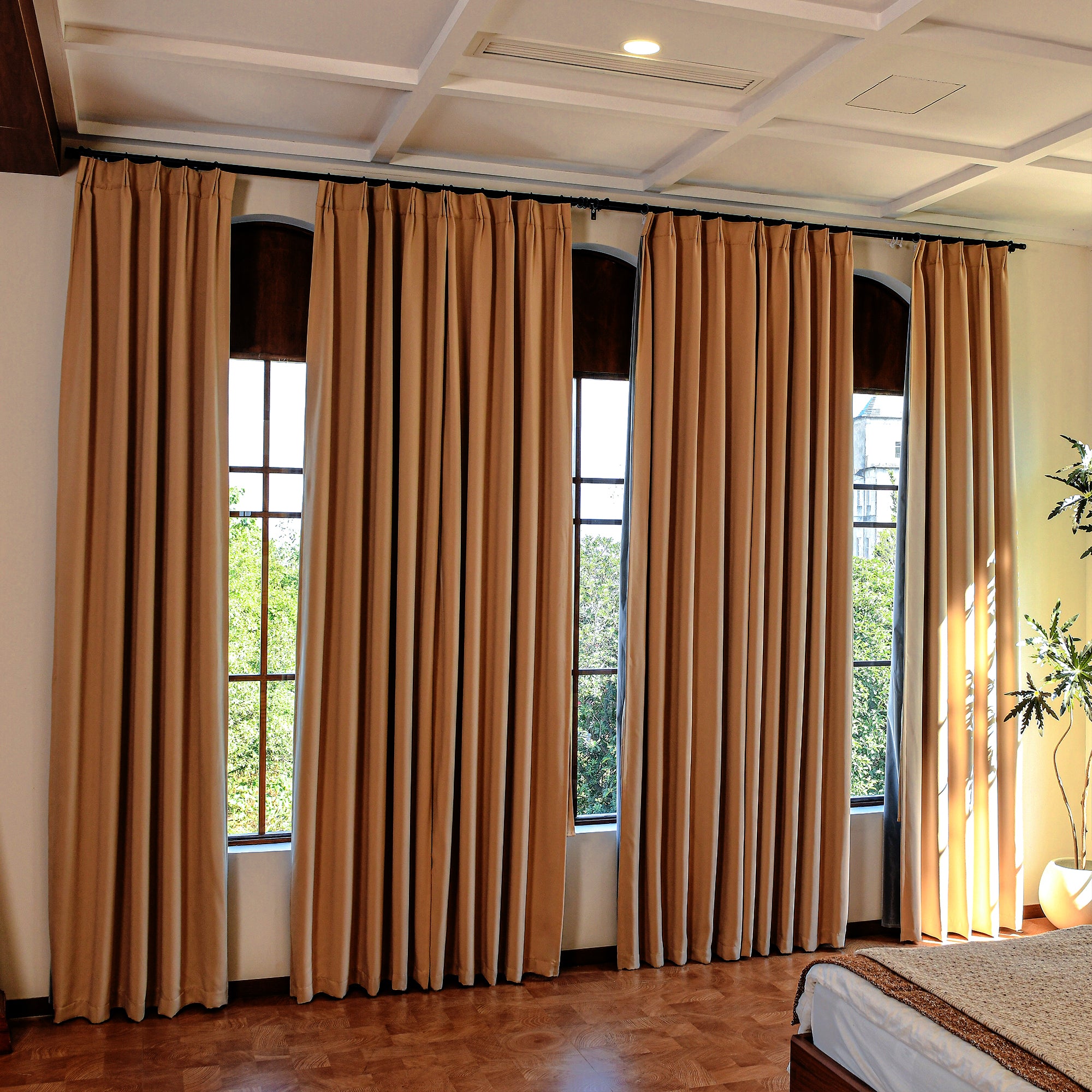 Custom blackout curtains with elegant drape in living room