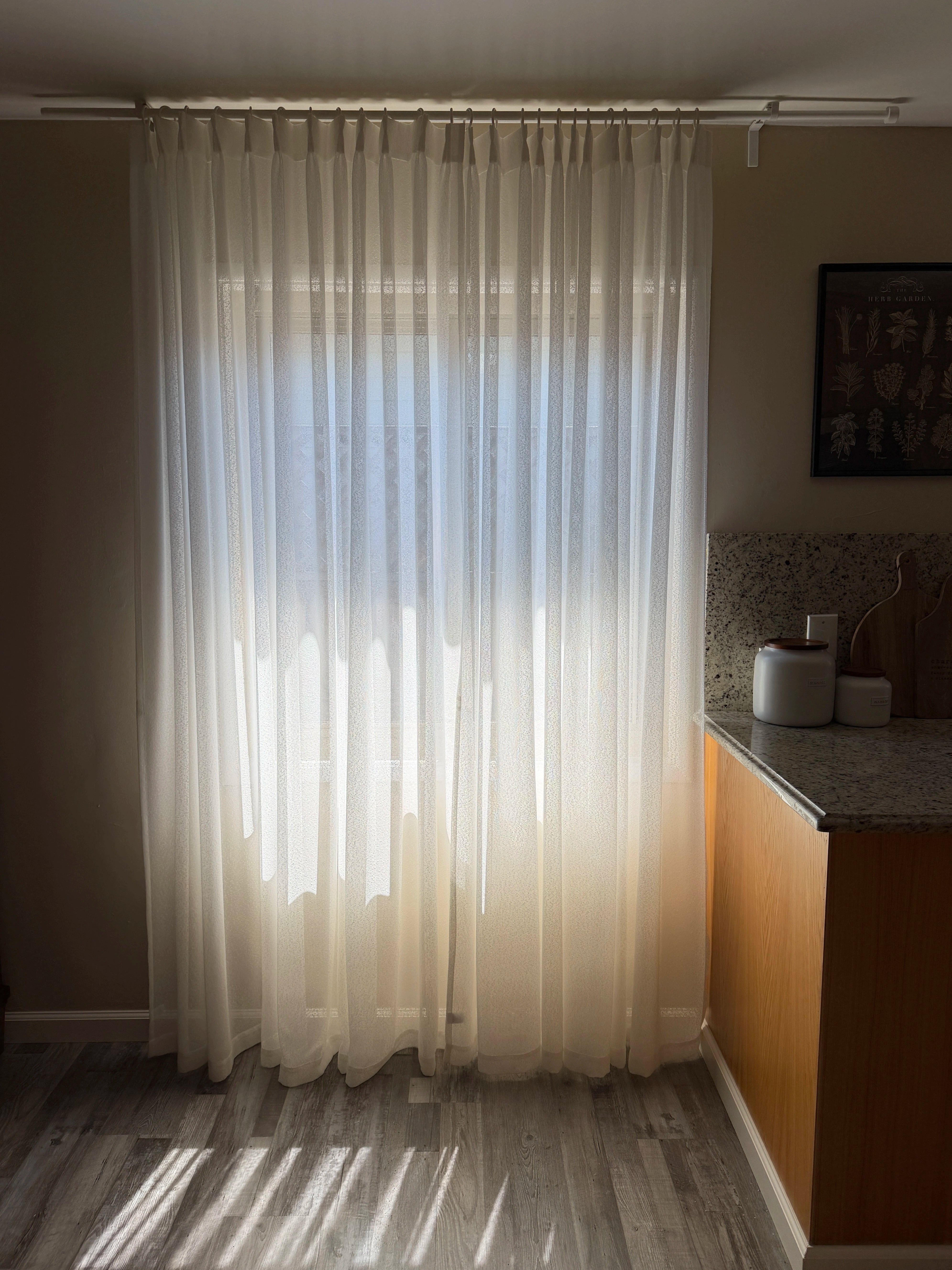 Custom Selene Snow Mist Linen Sheer Curtain by DWCN Official hanging in a modern living room with soft natural light
