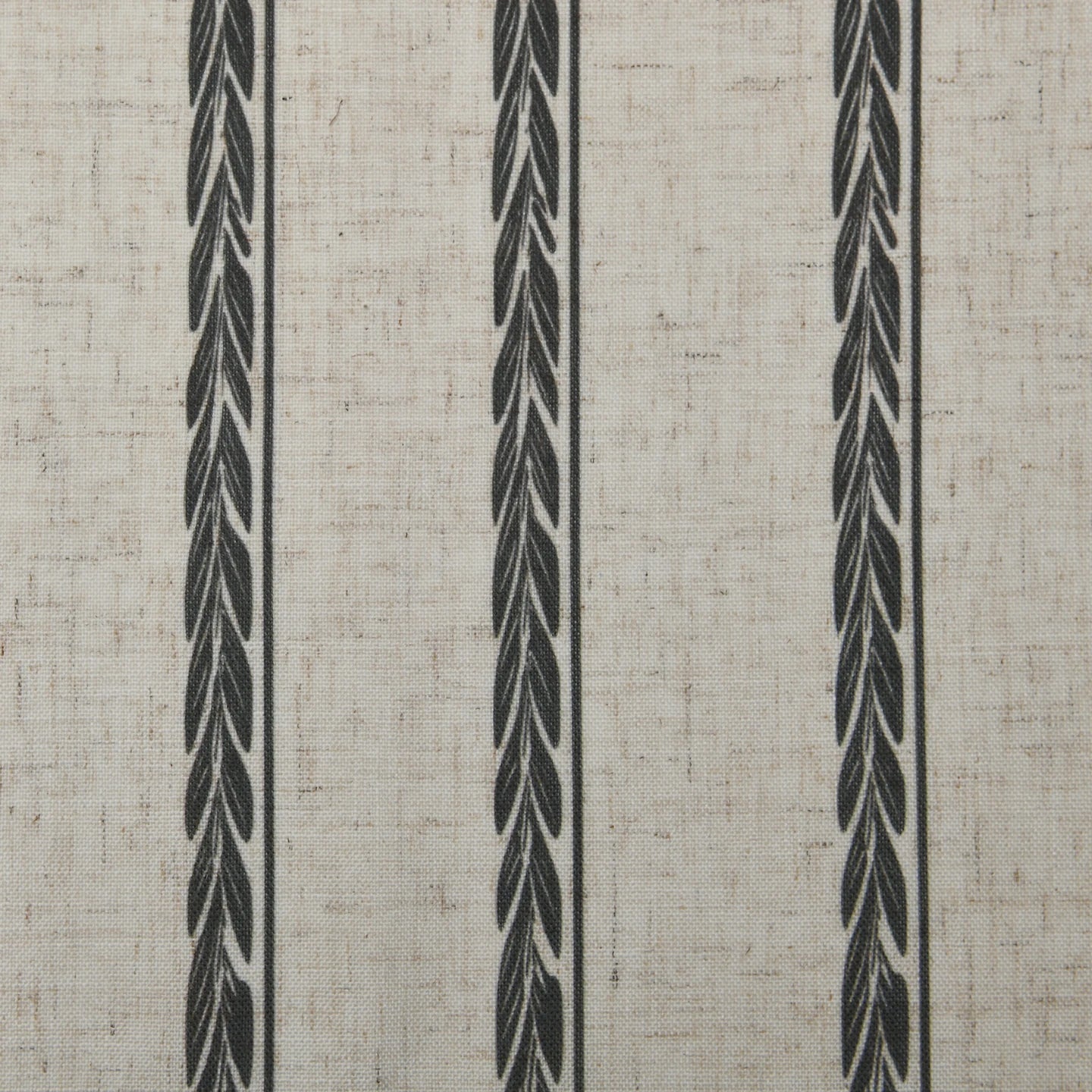 Demeter Aurata patterned linen curtains by DWCN Official hanging in a room, featuring a vibrant, intricate gold and navy design.