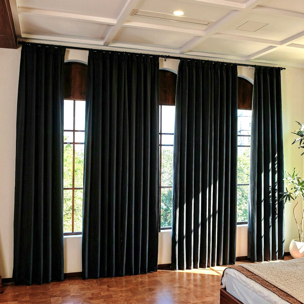Dark luxury silk-fiber blackout curtains from DWCN Official, showcasing their deep black color and elegant drape.