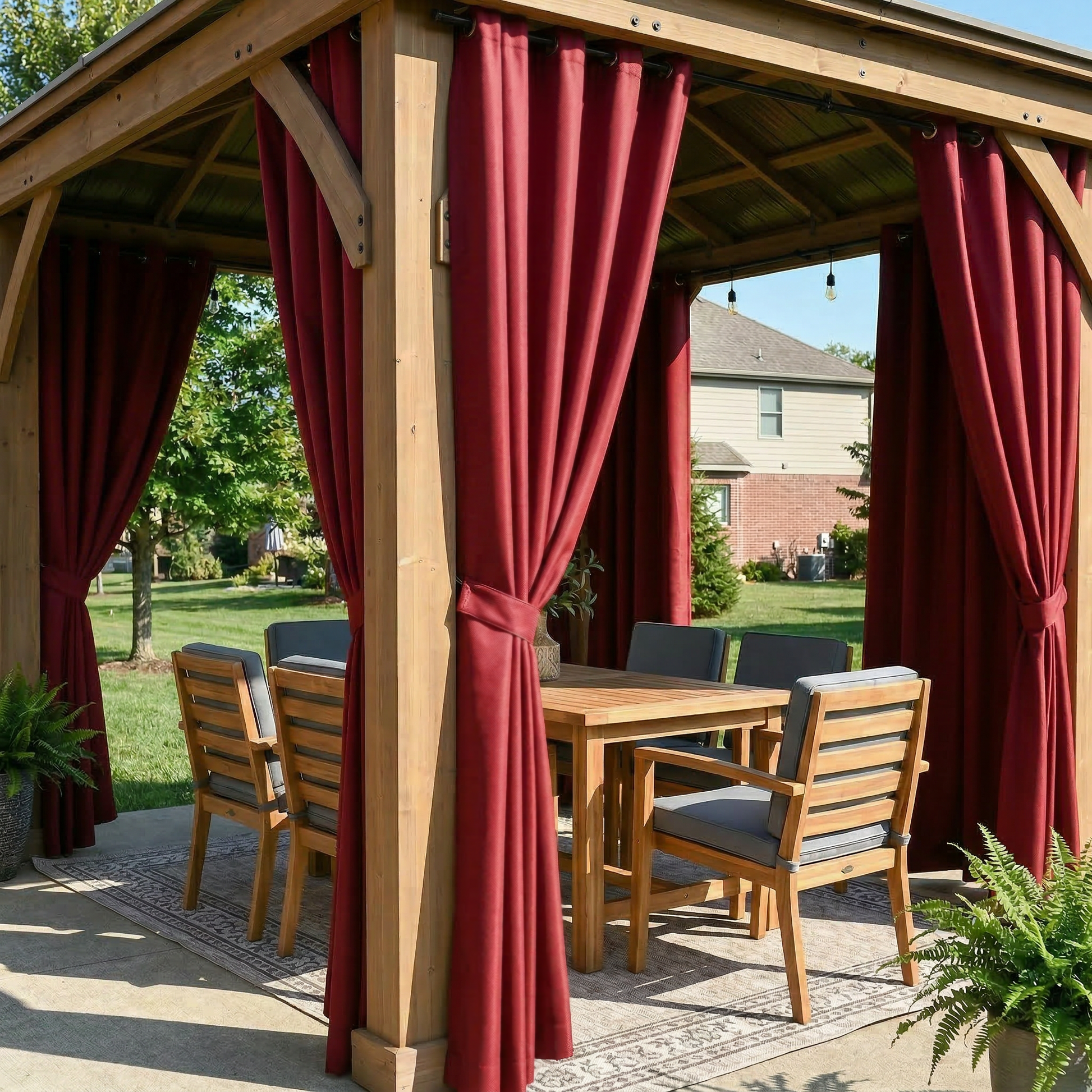 Burgundy red waterproof grommet top outdoor curtain by DWCN Official hanging on patio for weather-resistant privacy and shade