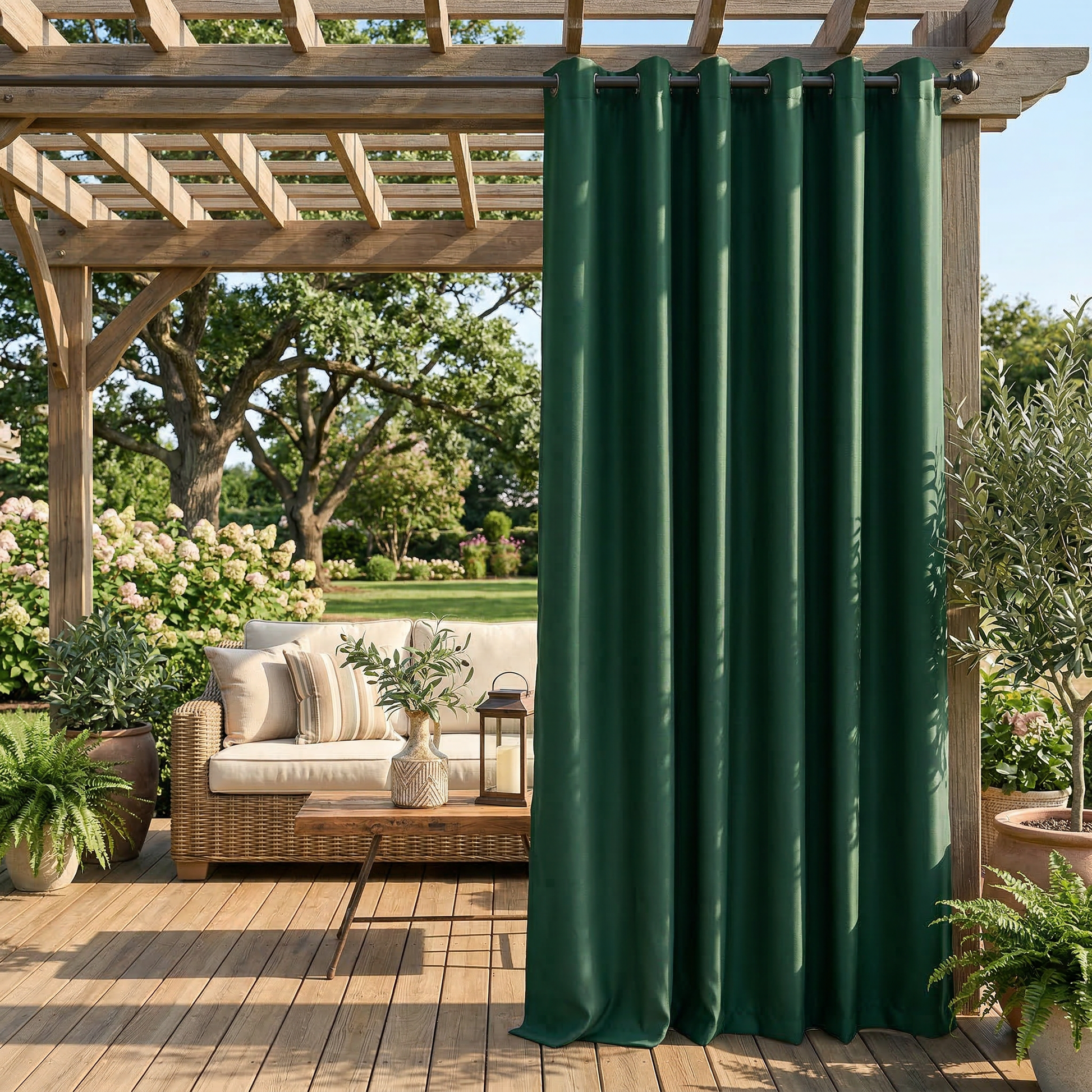 Dark green waterproof grommet top outdoor curtain by DWCN Official hanging on a patio rod, ideal for weather-resistant outdoor decor.