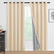 Set of two DWCN blackout curtains with tiebacks in solid black fabric, designed for light blocking and privacy.