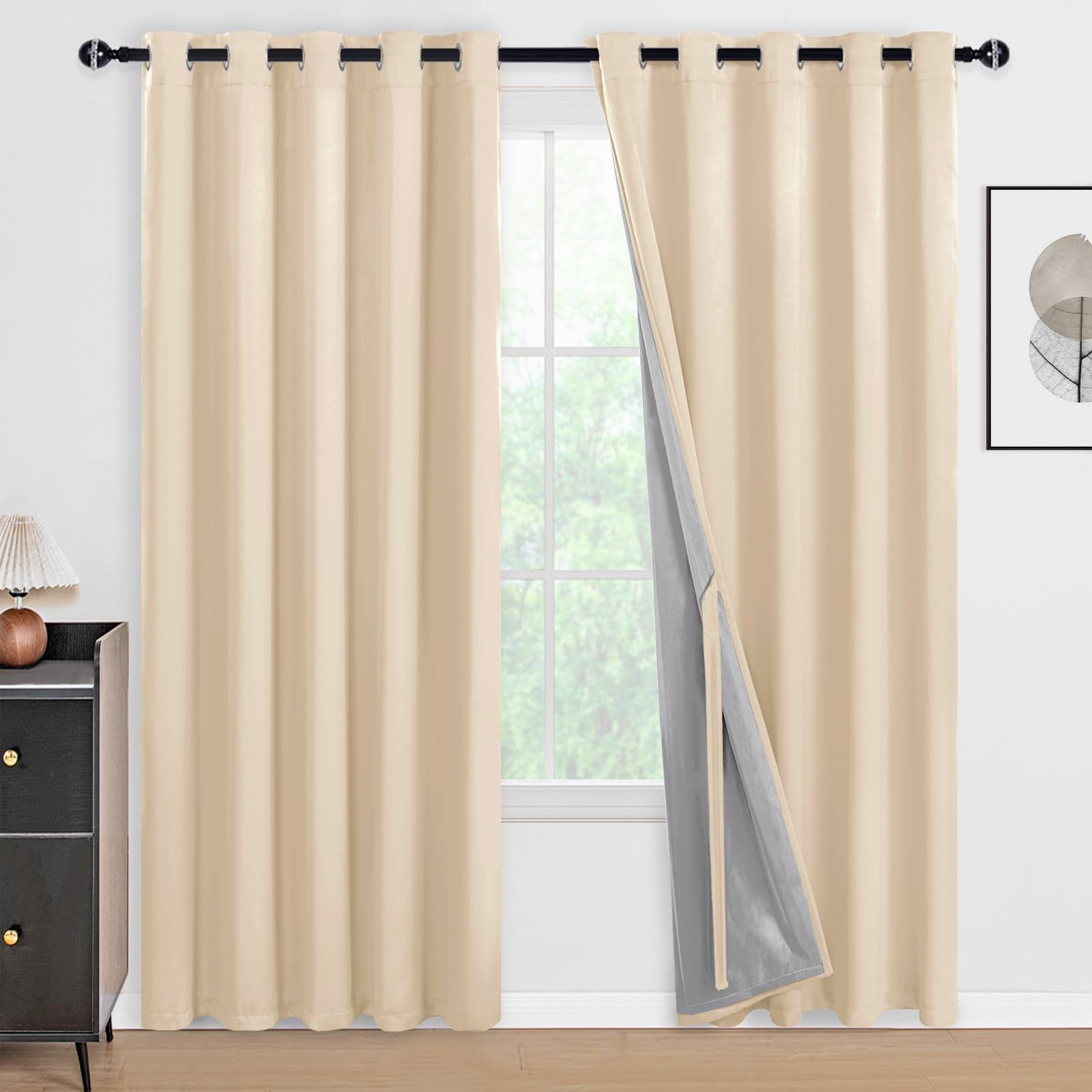 Set of two DWCN blackout curtains with tiebacks in solid black fabric, designed for light blocking and privacy.