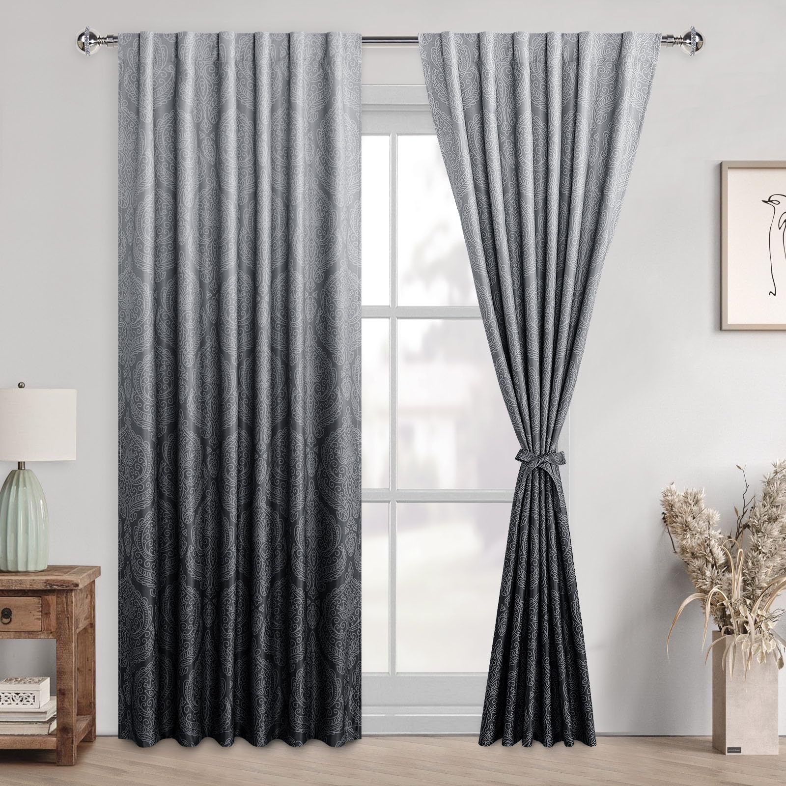 Pair of DWCN Official black blackout curtains with ombre design and tiebacks, set of 2 panels hanging on a window.