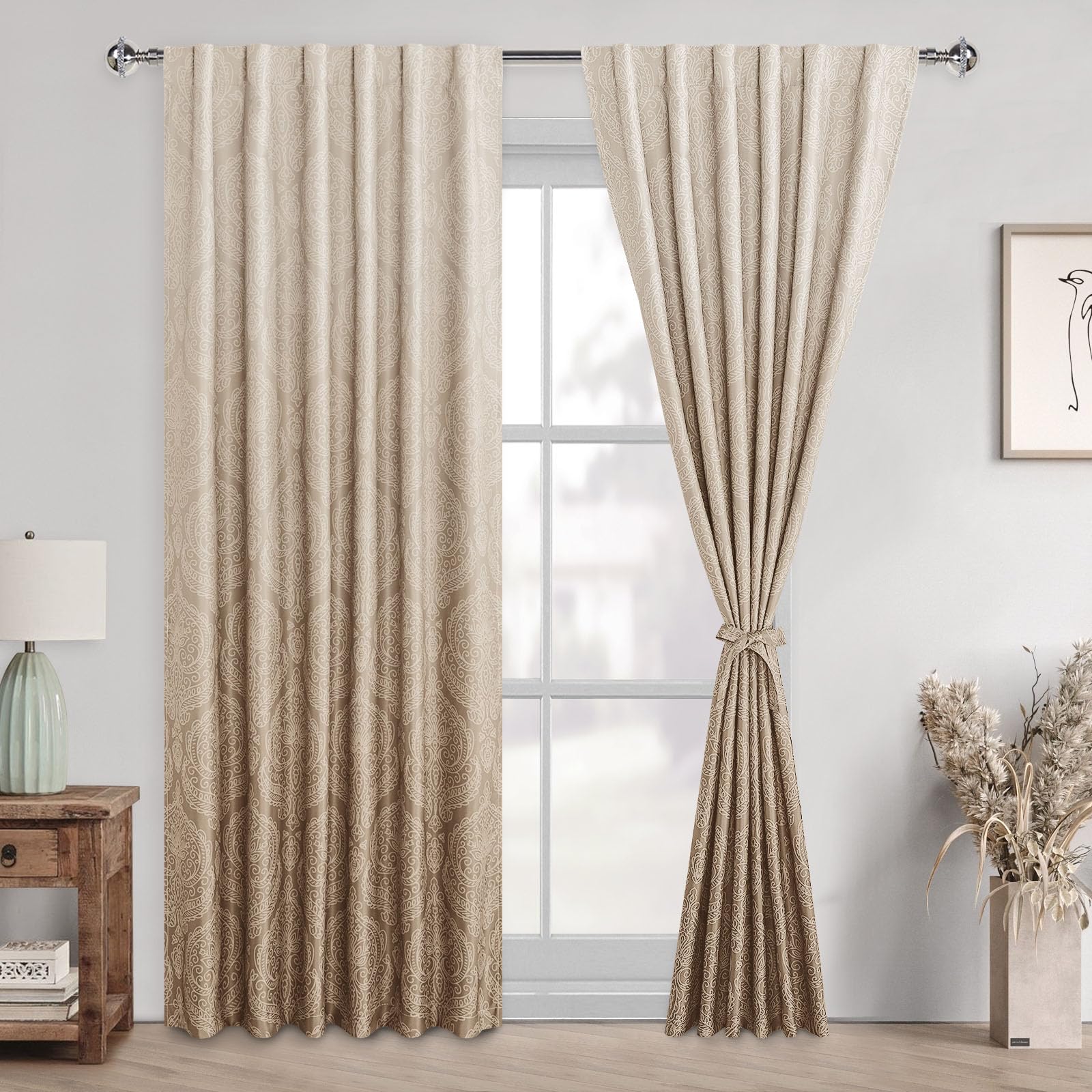 Two DWCN Official blackout curtain panels with ombre black design and tiebacks hanging on a window.