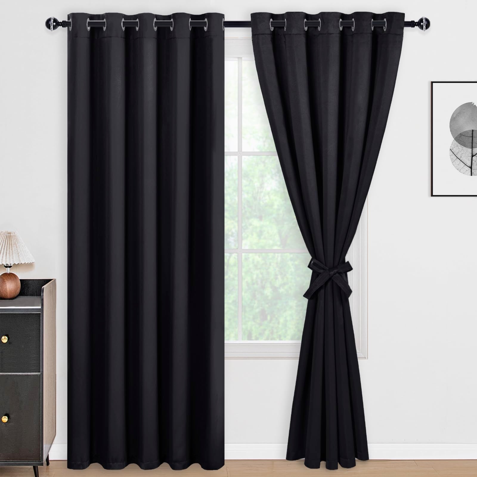 Set of two DWCN blackout curtains with tiebacks in solid black fabric, showcasing the curtain panels hanging side by side.