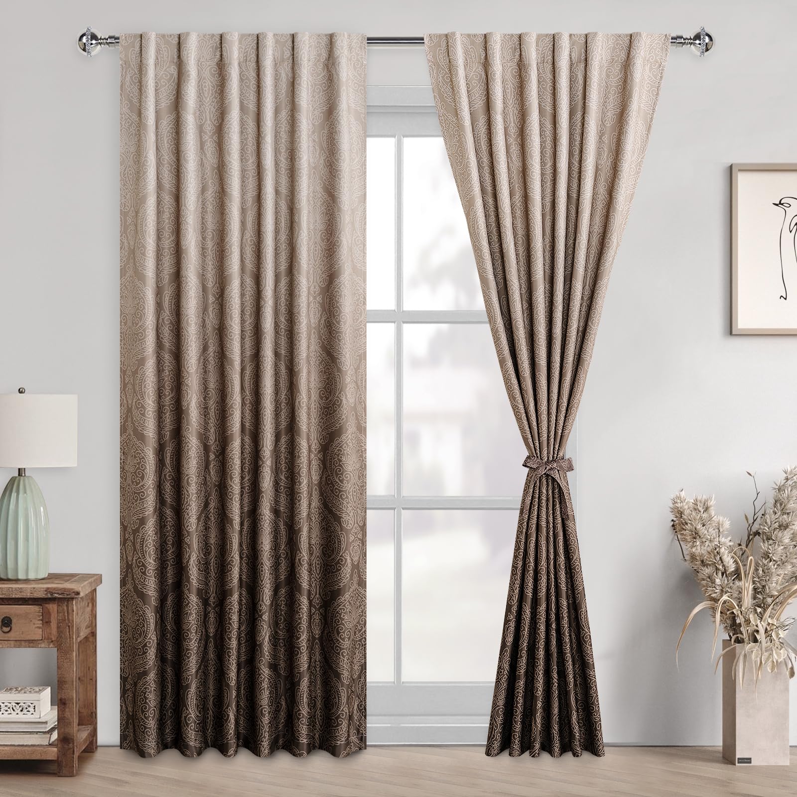 Pair of DWCN Official black blackout curtains with tiebacks in an ombre black design, hanging in a modern living room.