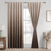 Pair of DWCN Official black blackout curtains with tiebacks in an ombre black design, hanging in a modern living room.