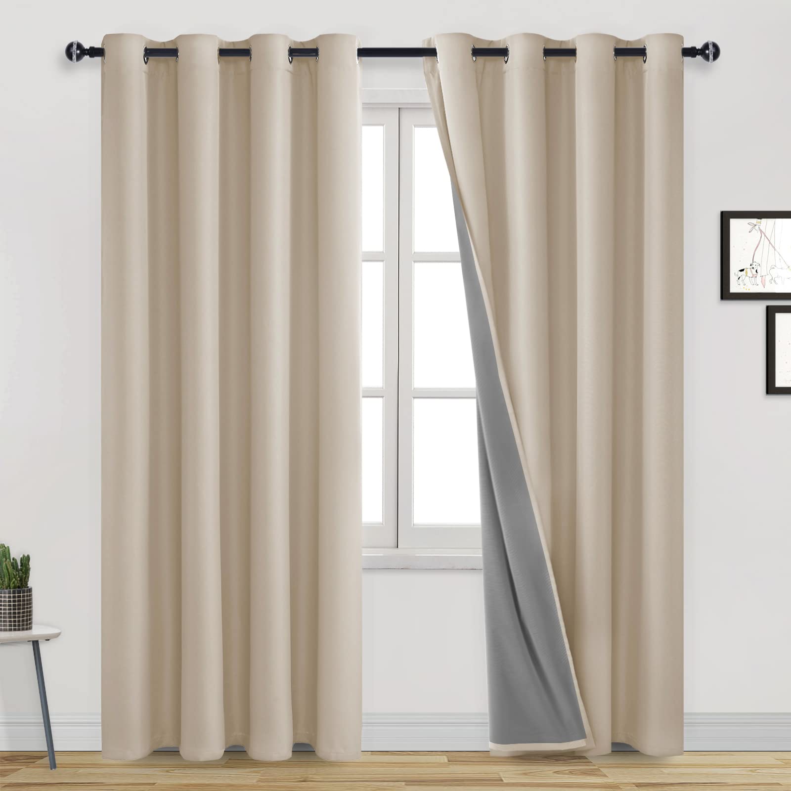 DWCN blackout curtains with grommet top design, 100% blackout fabric, hanging on a window for light-blocking and privacy.