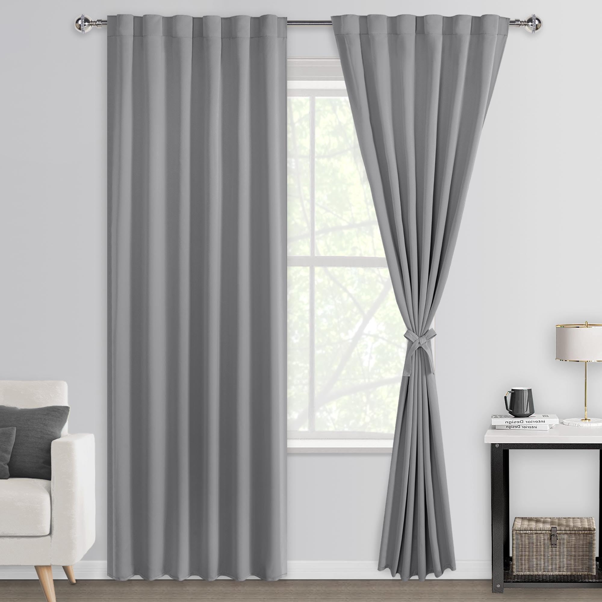 Pair of DWCN Official black blackout curtains with tiebacks, rod pocket and back tab design in a set of two panels.