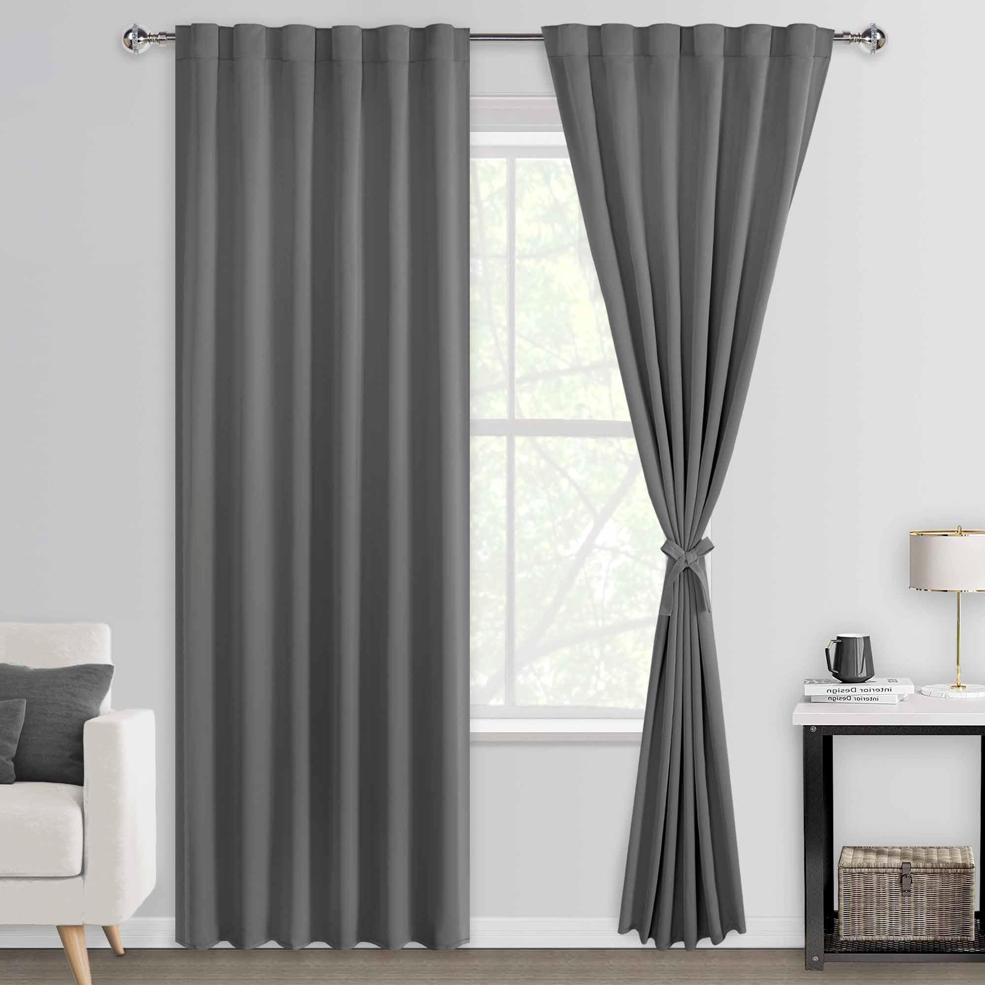 Pair of DWCN Official blackout curtains with tiebacks, rod pocket and back tab design, set of two panels for bedroom or living room.