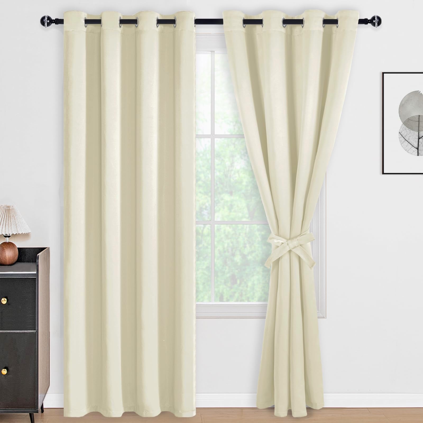Two black blackout curtain panels with tiebacks from DWCN Official, featuring a smooth fabric and classic design.