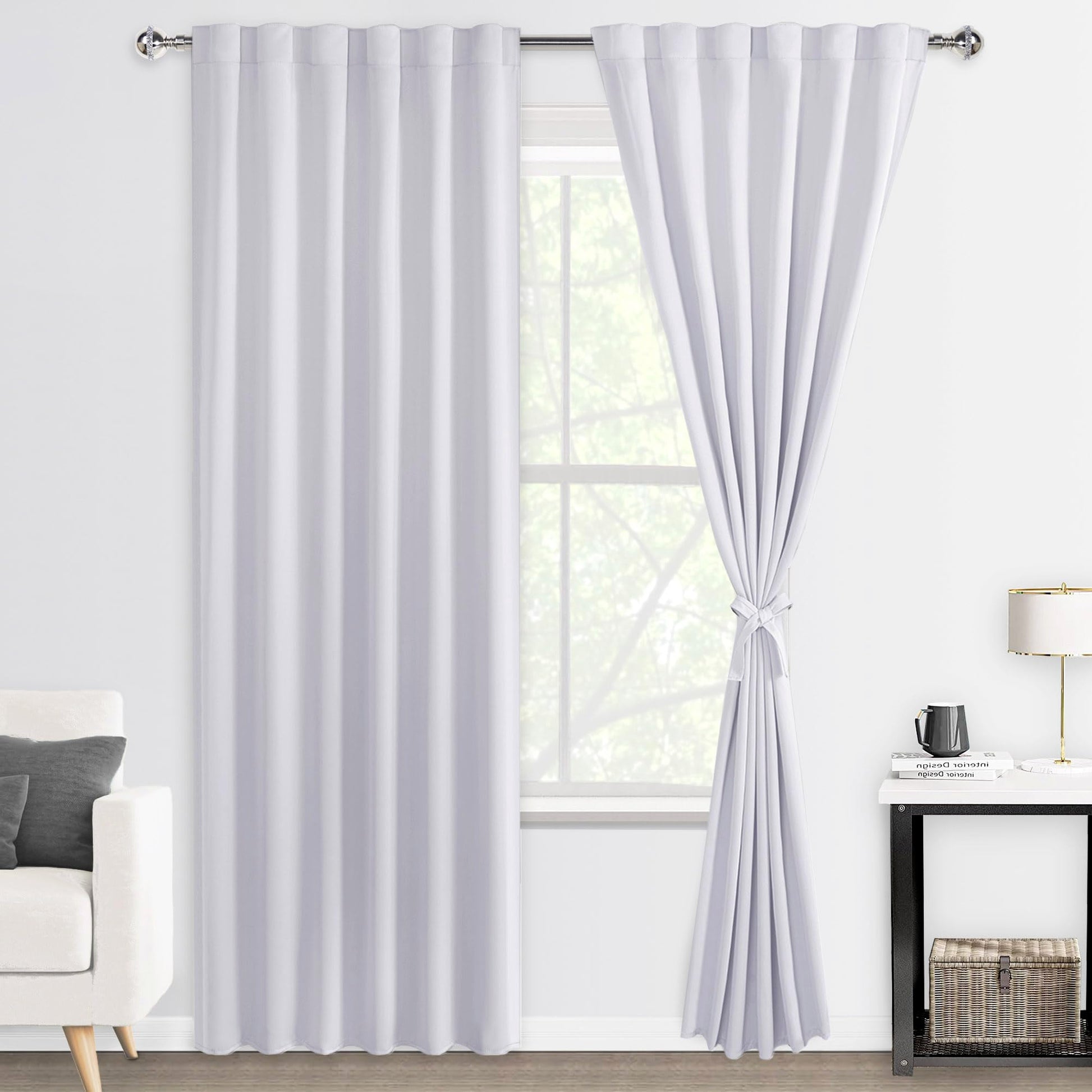 DWCN Blackout Curtains with tiebacks, rod pocket and back tab design, set of 2 panels hanging in a modern bedroom window.