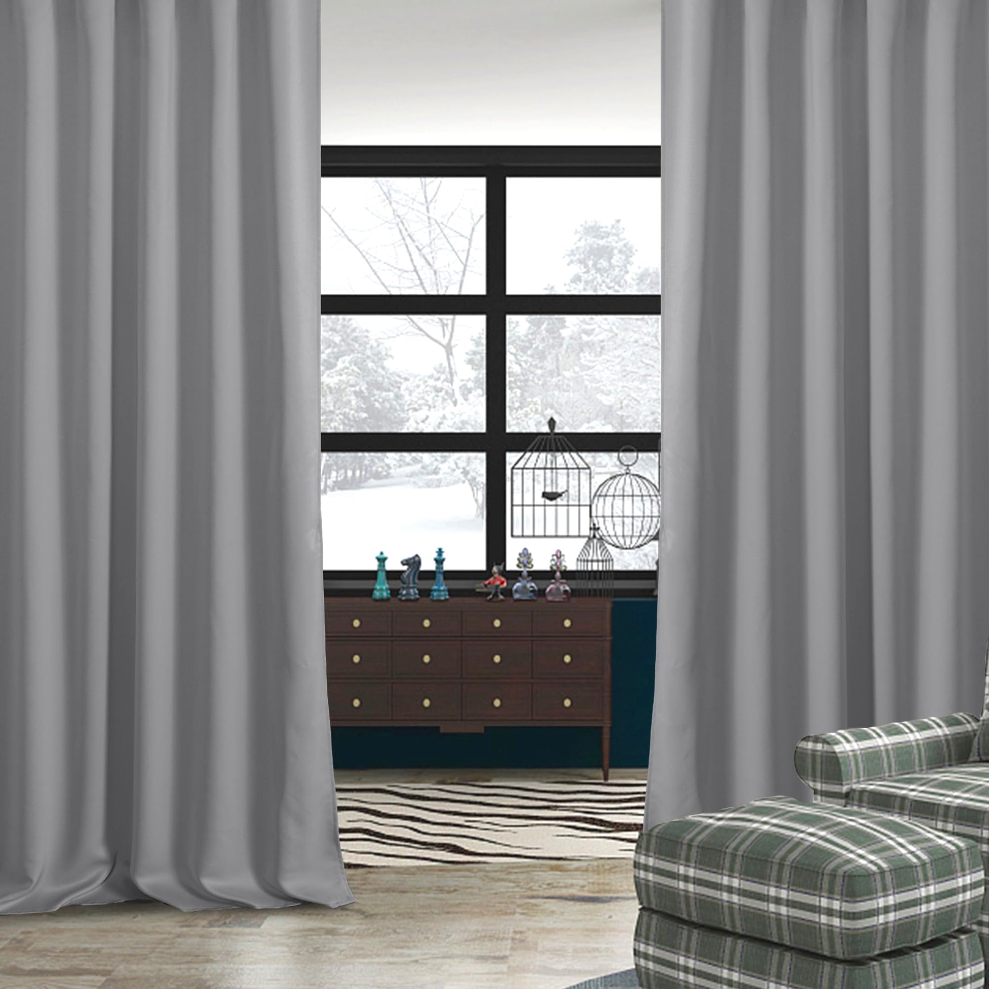 Pair of DWCN Blackout Curtains with tiebacks, rod pocket and back tab design, set of two panels hanging on a window.