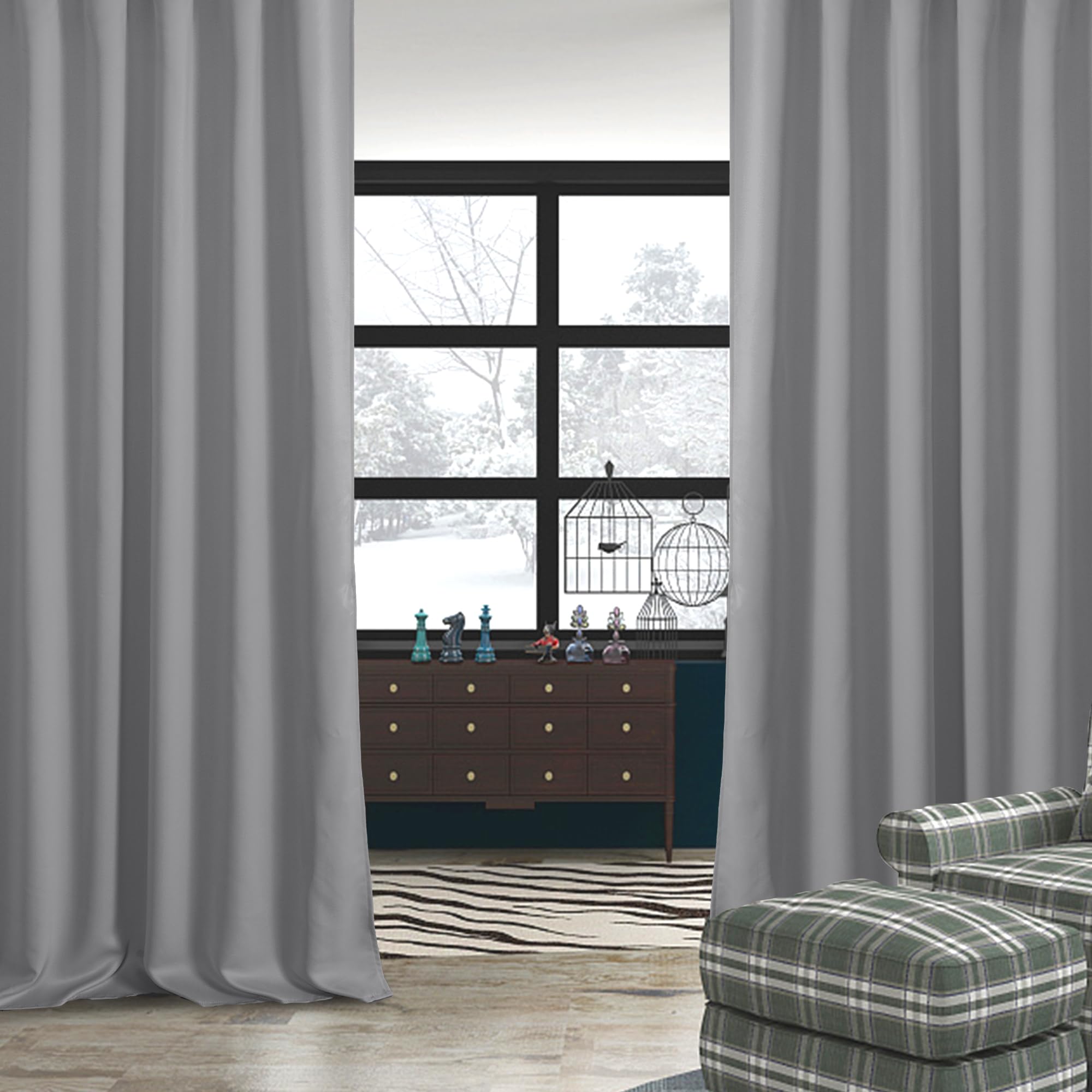 Pair of DWCN Blackout Curtains with tiebacks, rod pocket and back tab design, set of two panels hanging on a window.