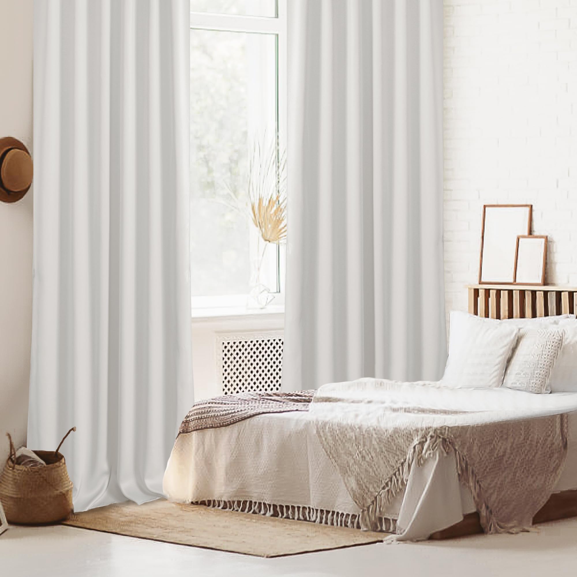Pair of DWCN Official black blackout curtains with tiebacks, rod pocket and back tab design, set of two panels.