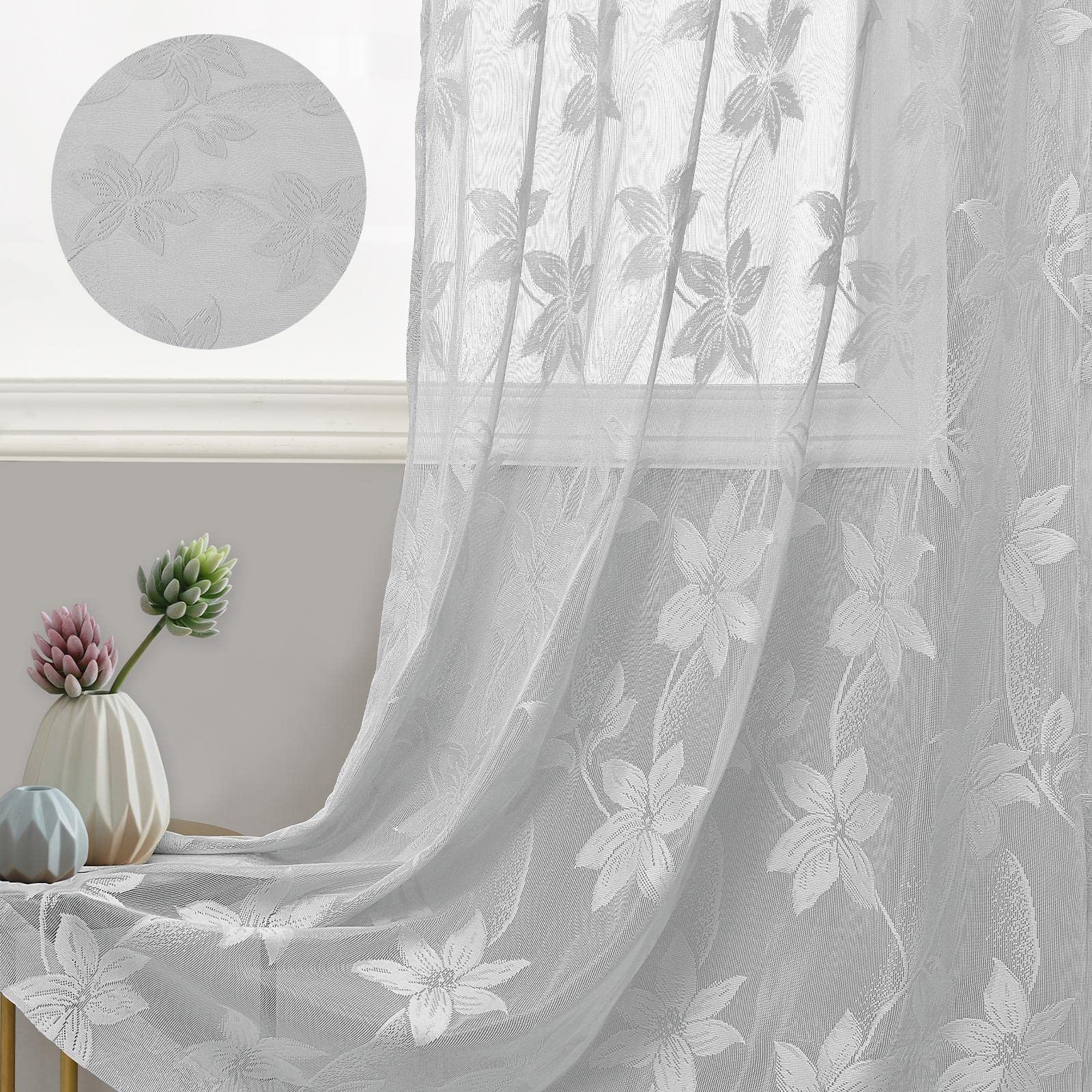 Pair of DWCN Official lace sheer curtains with intricate floral patterns, hanging in a bright window setting.