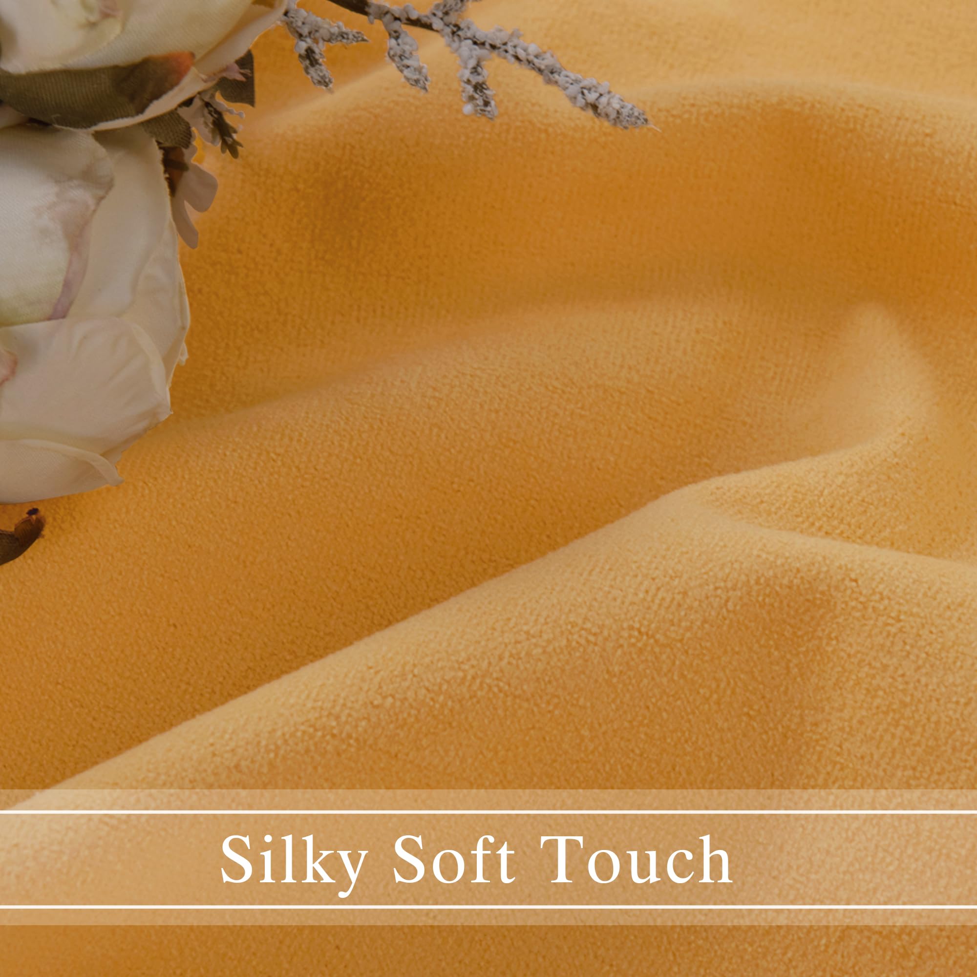 Two DWCN Velvet Curtains panels with rod pocket and back tab hanging on a window, showcasing soft, luxurious fabric.