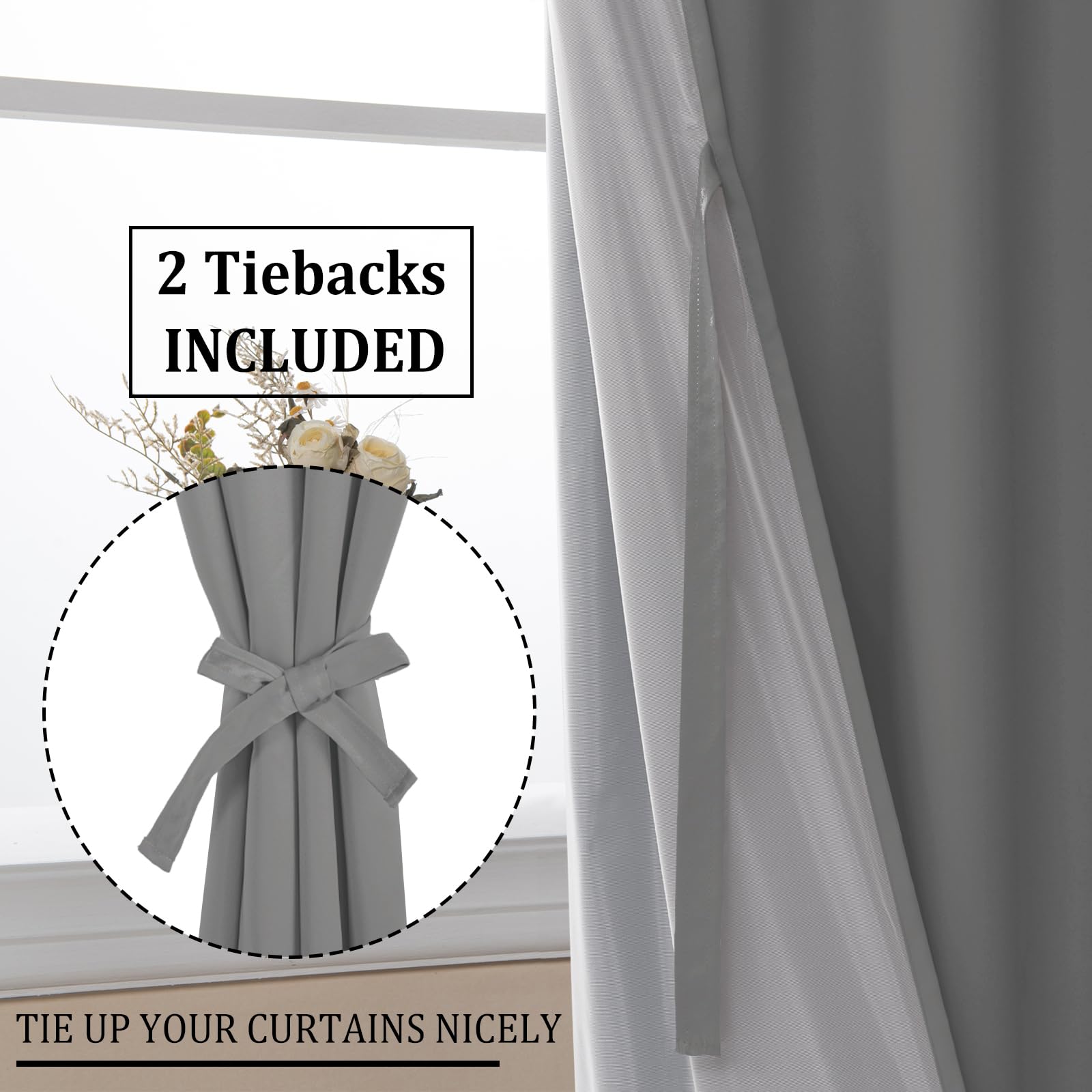 Set of two DWCN blackout curtains with tiebacks in solid black fabric hanging on a window, designed for light blocking.
