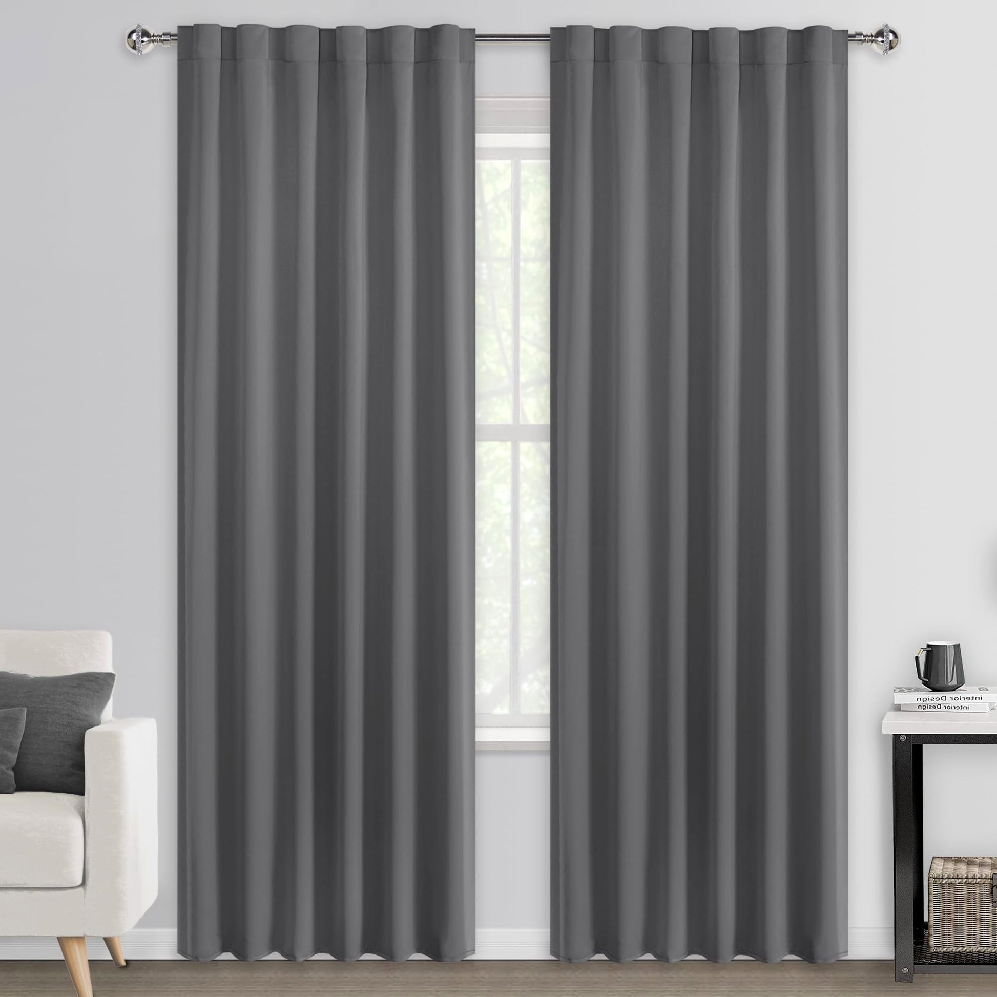 Pair of DWCN Official blackout curtains with tiebacks, rod pocket and back tab design, set of two panels, dark black fabric.