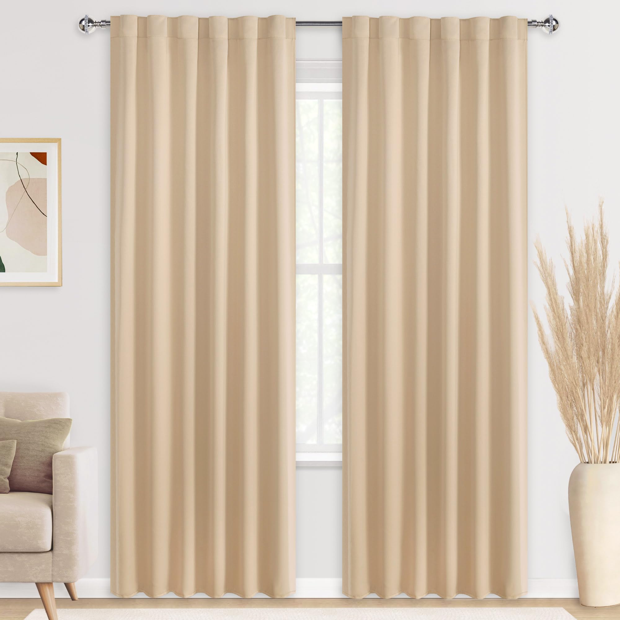 Pair of DWCN Blackout Curtains with tiebacks, rod pocket and back tab design, set of 2 panels hanging on a window.