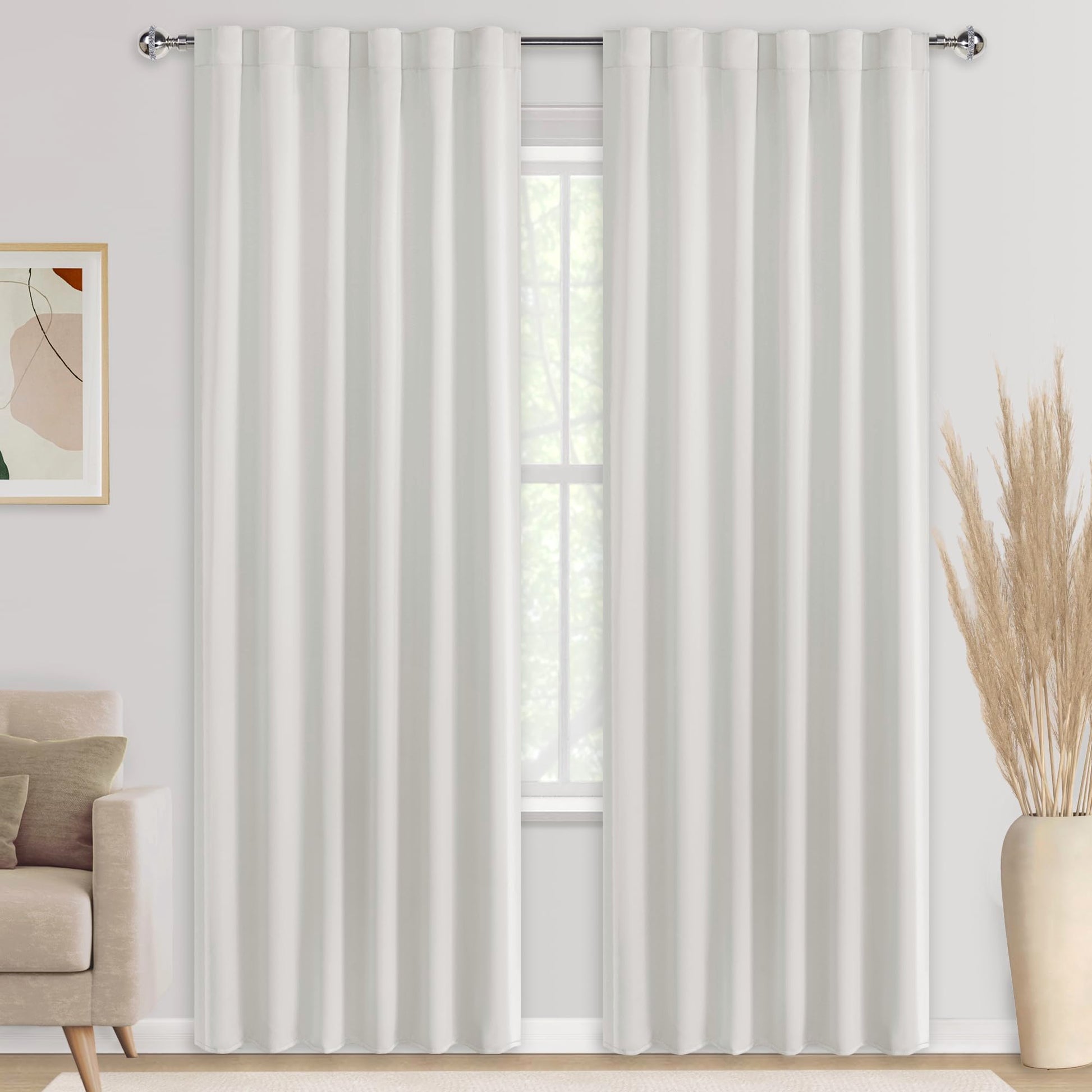 DWCN Blackout Curtains with tiebacks, rod pocket and back tab, set of 2 panels hanging in a modern living room window.